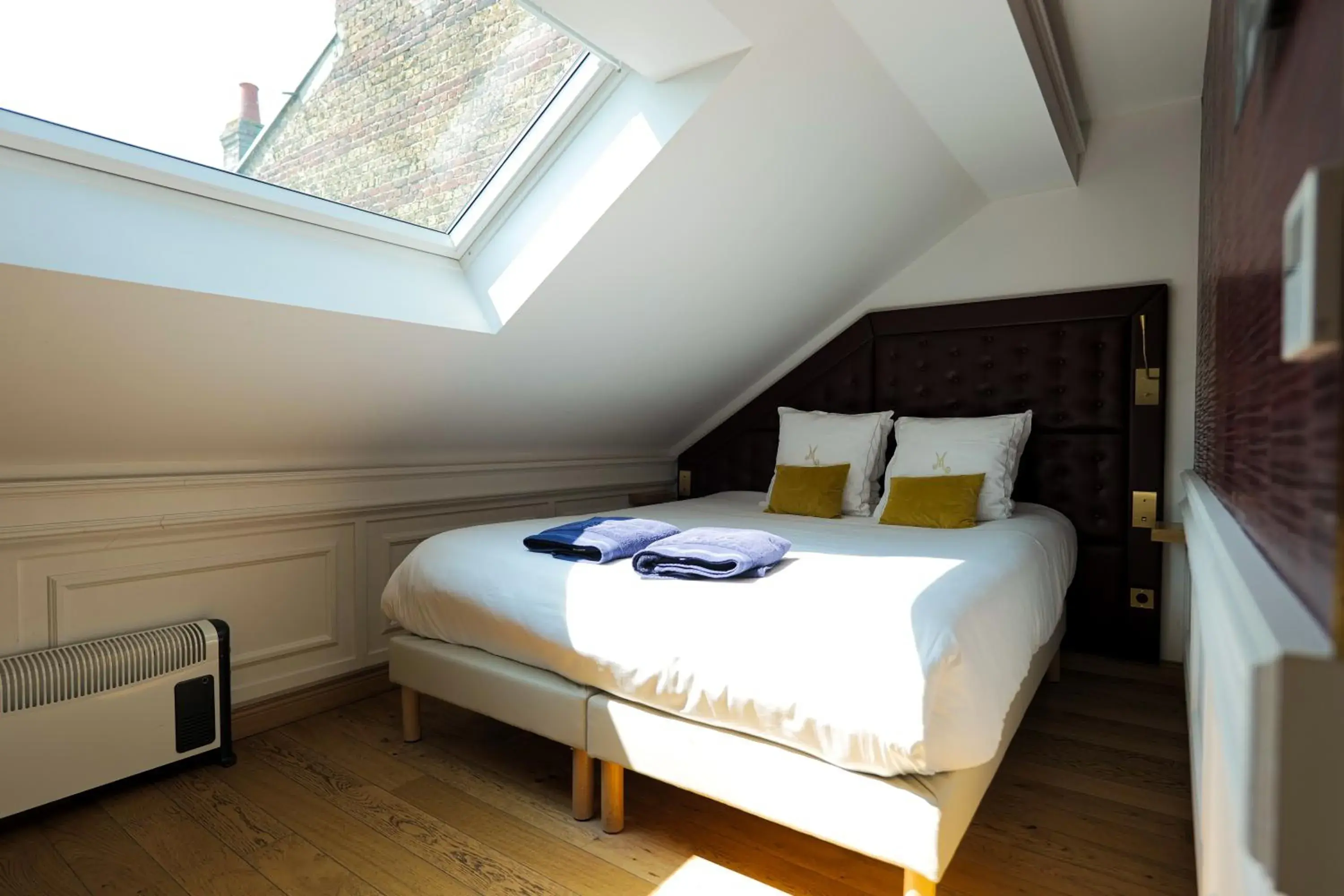 Bed in Hôtel Merveilleux Côté Mer Bed in Hôtel Merveilleux Côté Mer