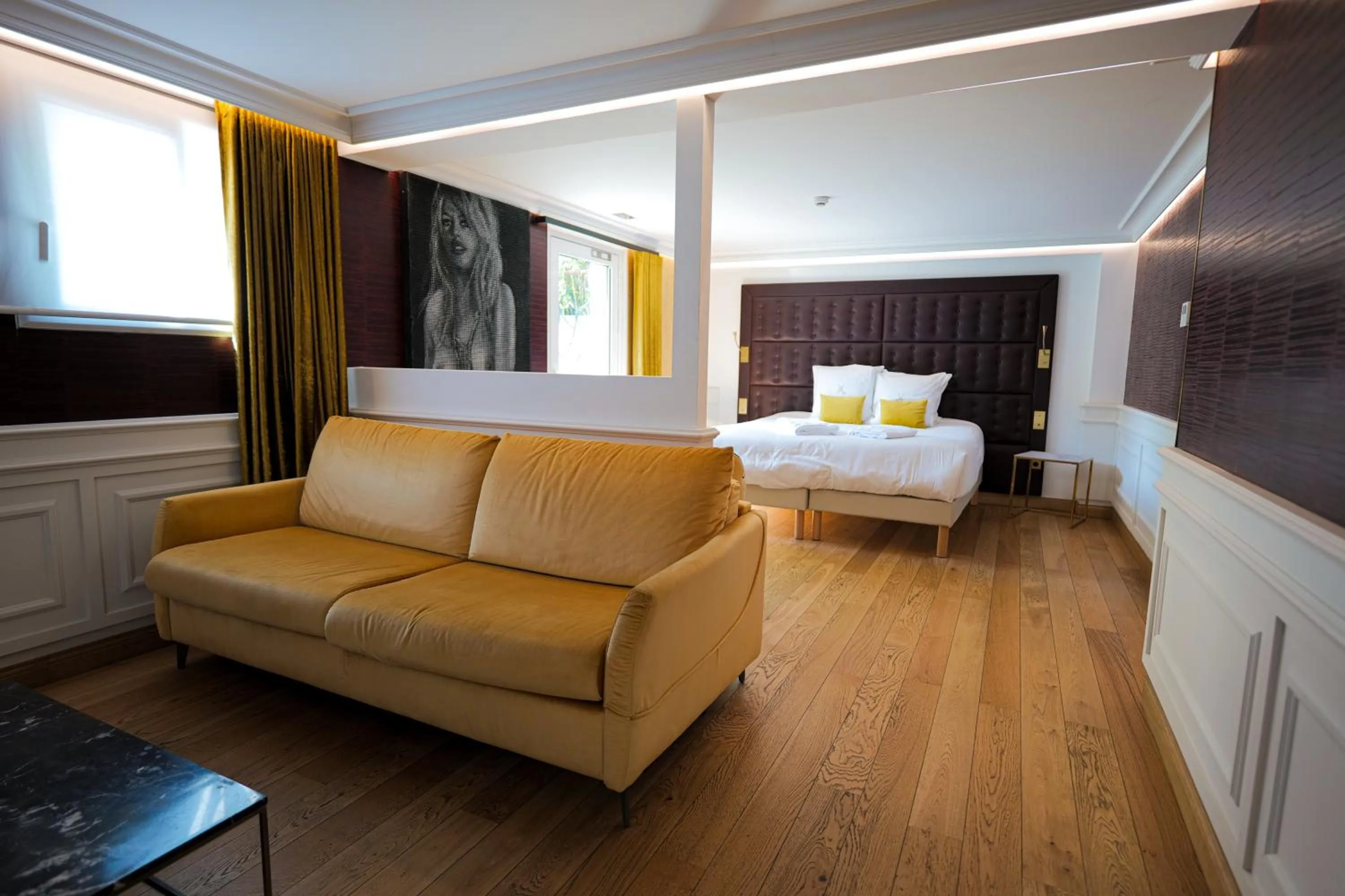 Bed in Hôtel Merveilleux Côté Mer