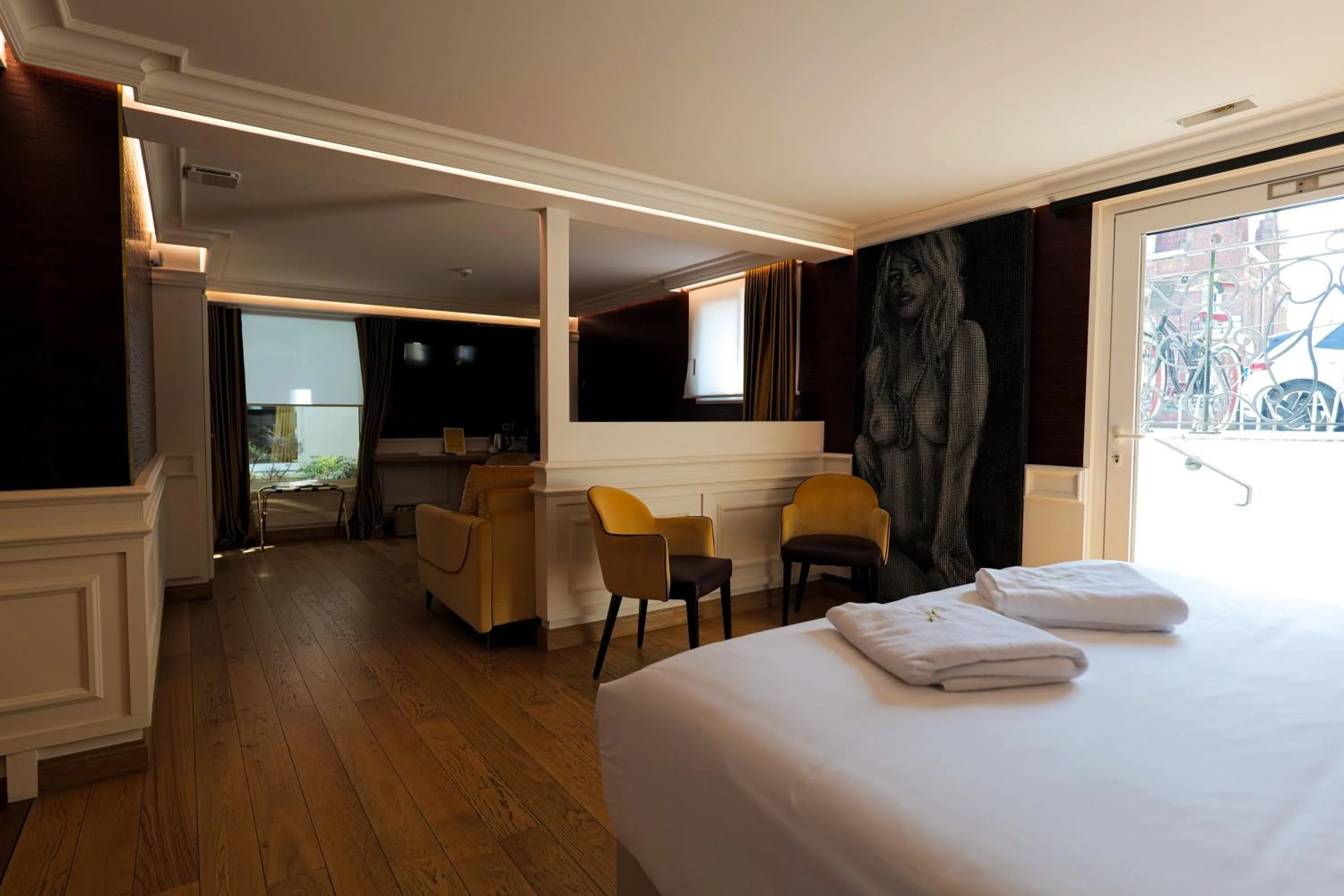 Bed in Hôtel Merveilleux Côté Mer