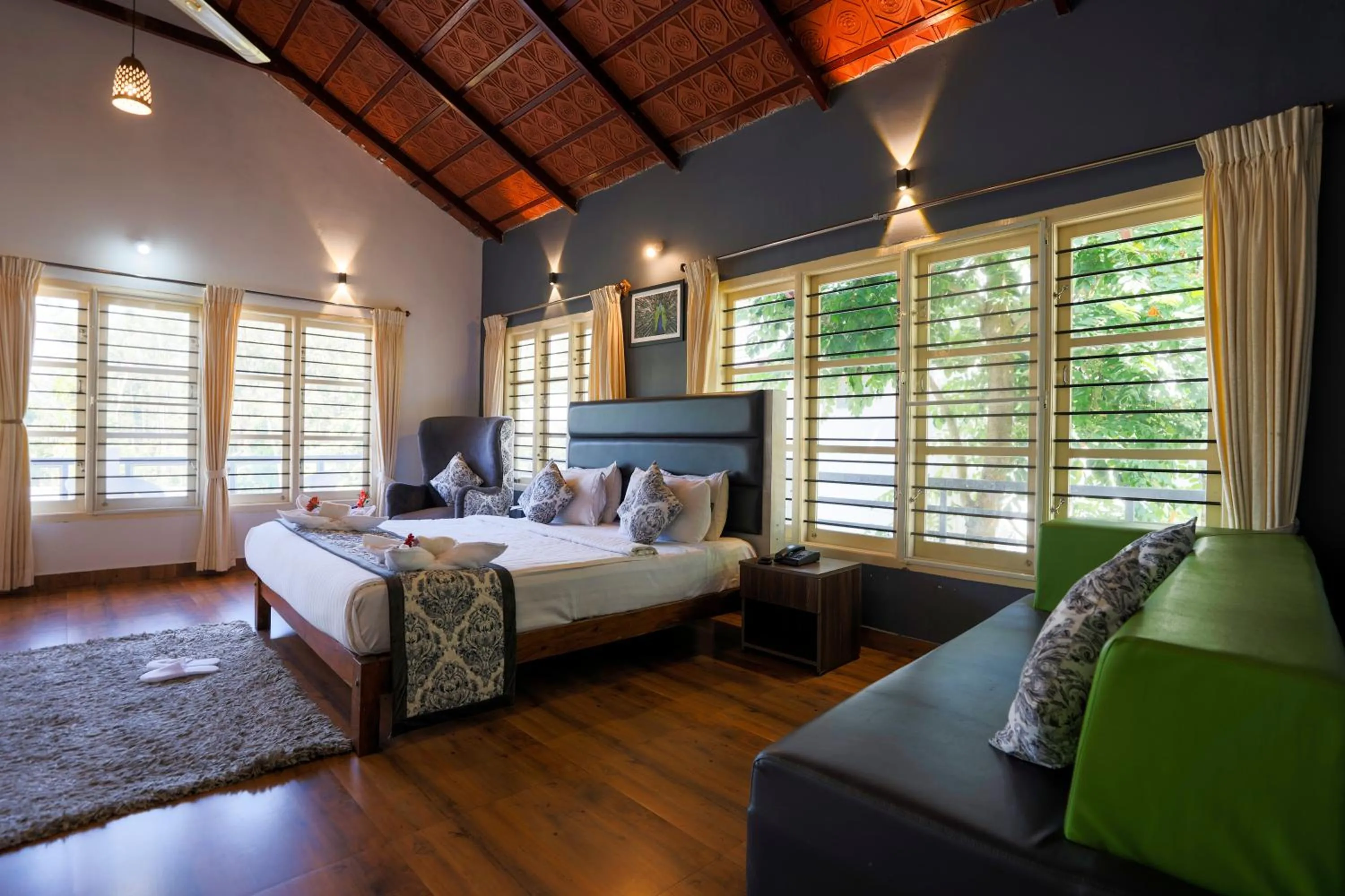 Seating area, Bed in The Blossom Resort - Chikmagalur