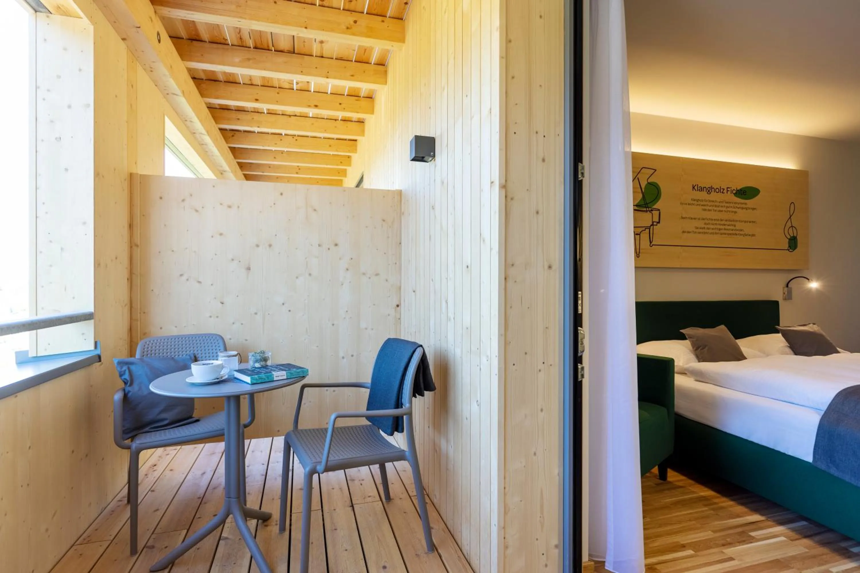 Balcony/Terrace, Bed in JUFA Hotel Laterns - Klangholzhus