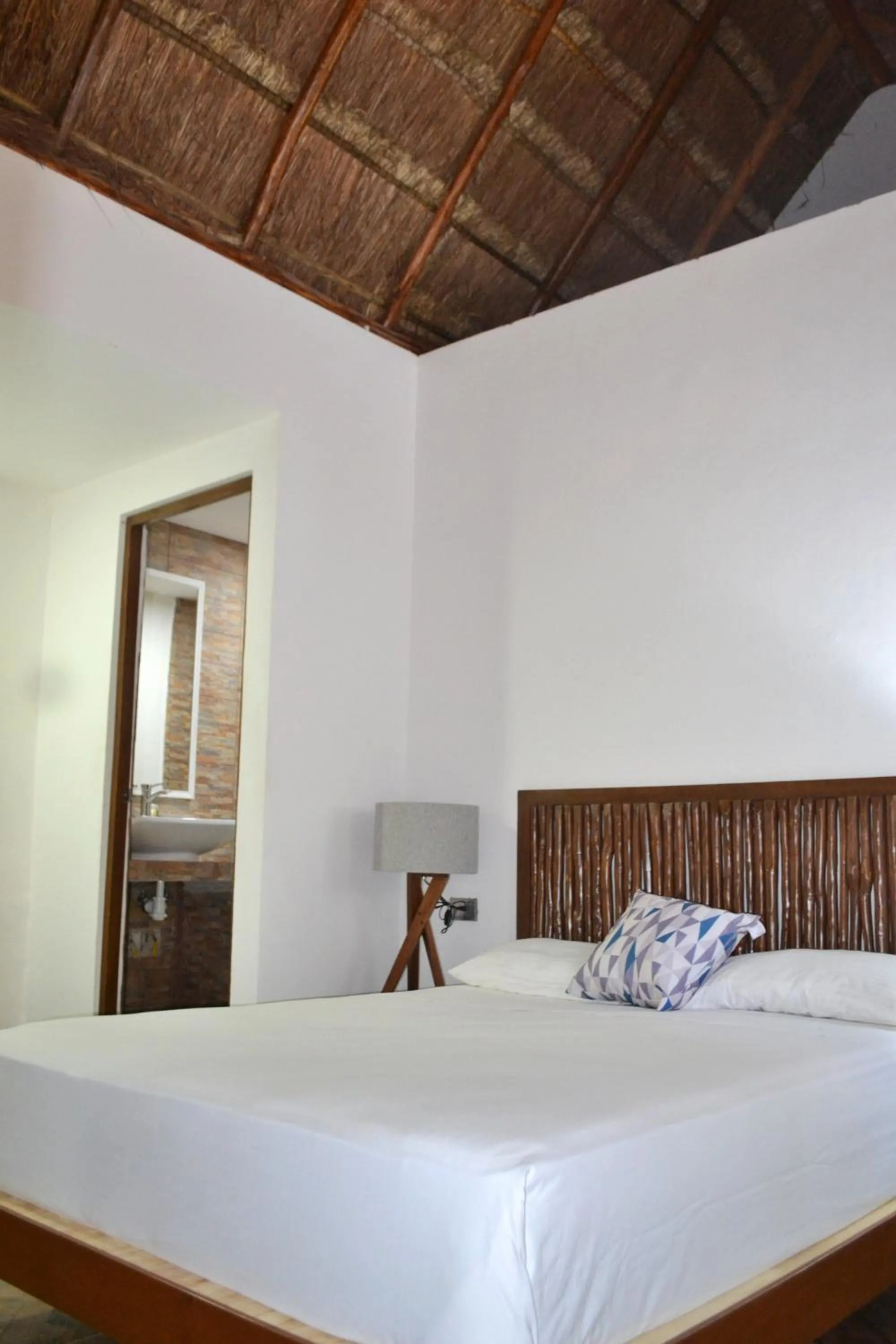 Bedroom in Kinta Kan Cabañas Hotel Playa del Carmen