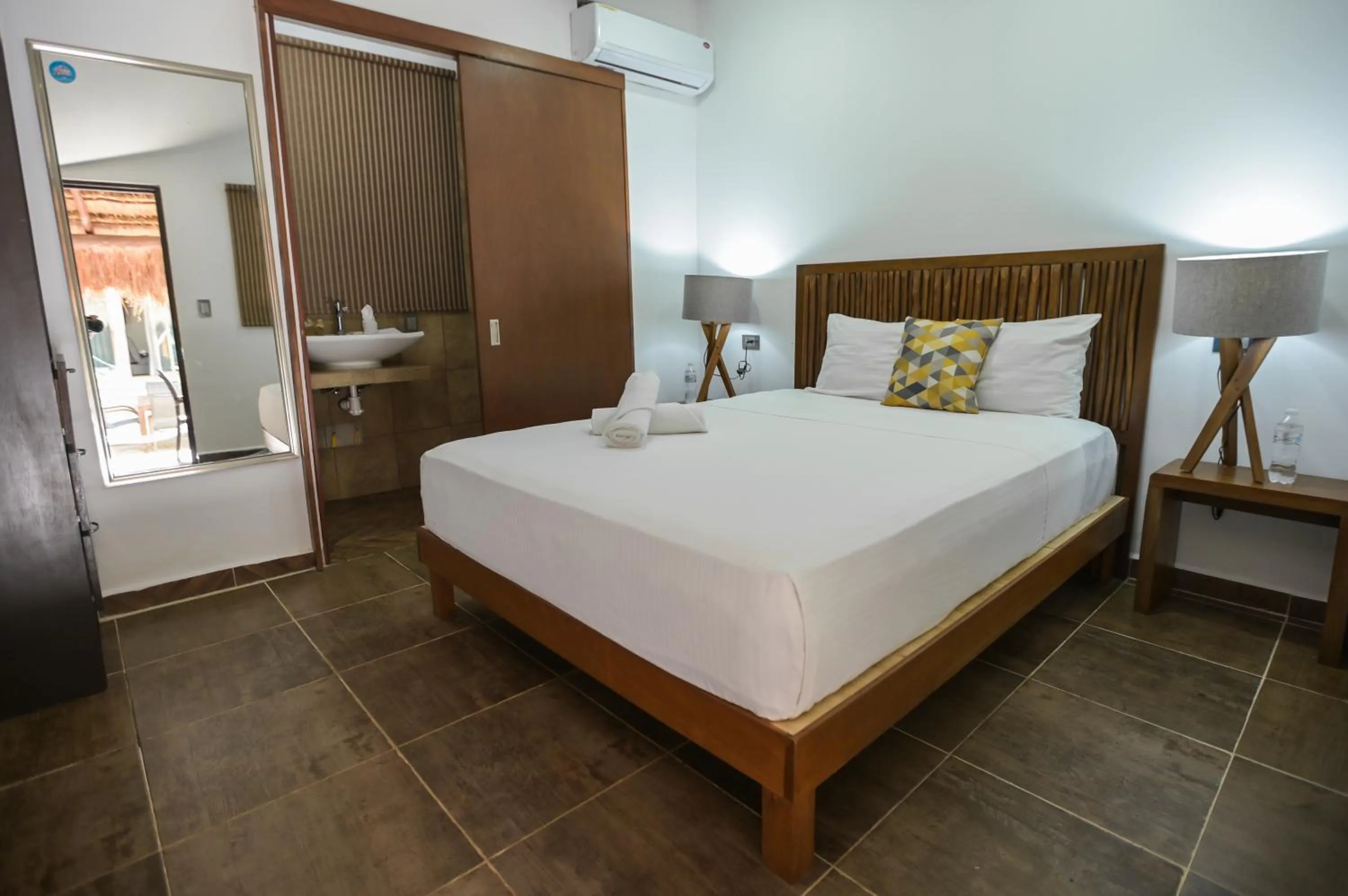 Bedroom in Kinta Kan Cabañas Hotel Playa del Carmen