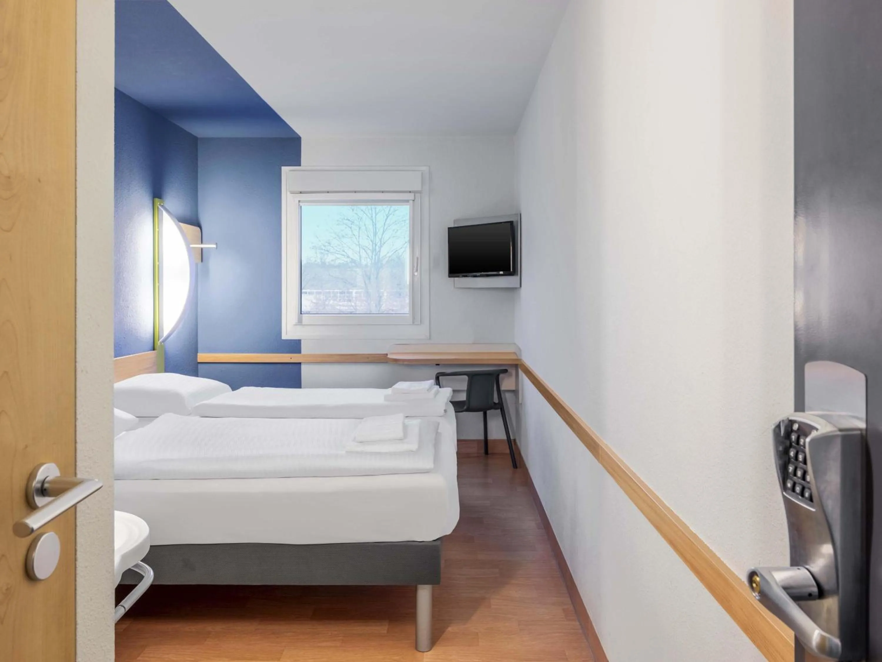 Bed in B&B HOTEL Saarbrücken-Ost