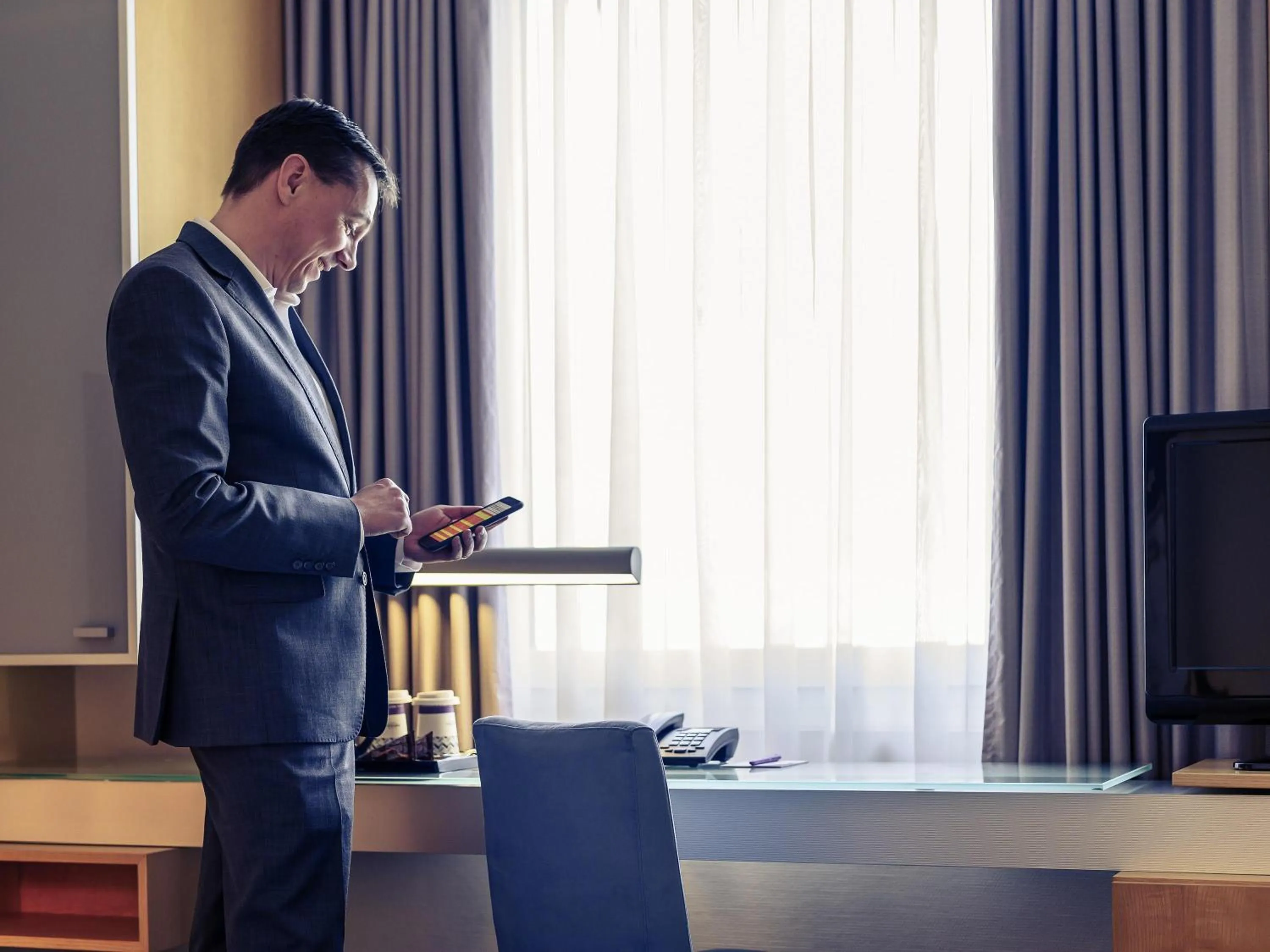 Bedroom in Mercure Hotel Düsseldorf City Nord