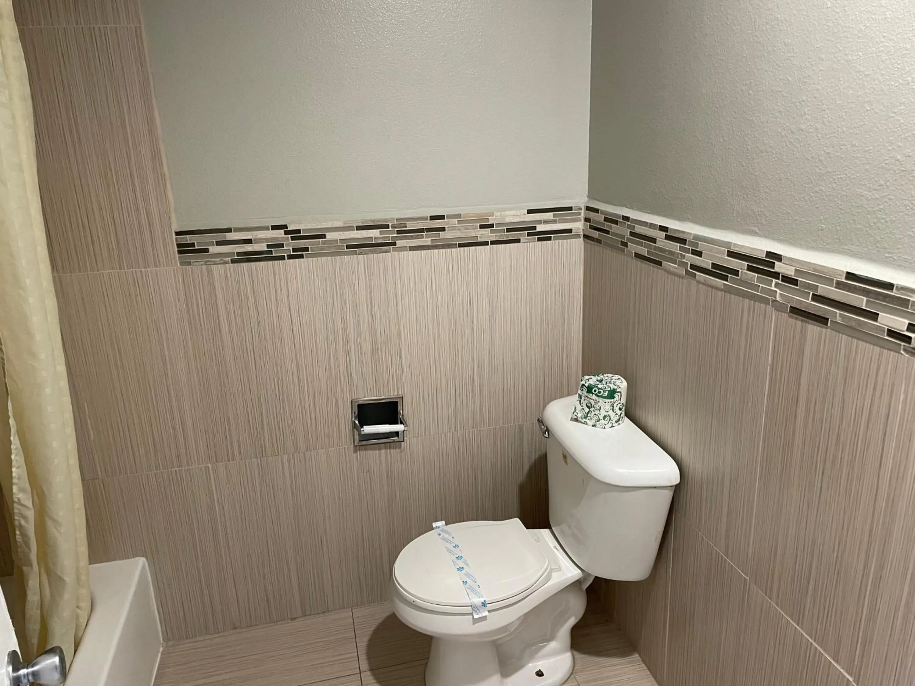 Bathroom in Heritage inn and suites