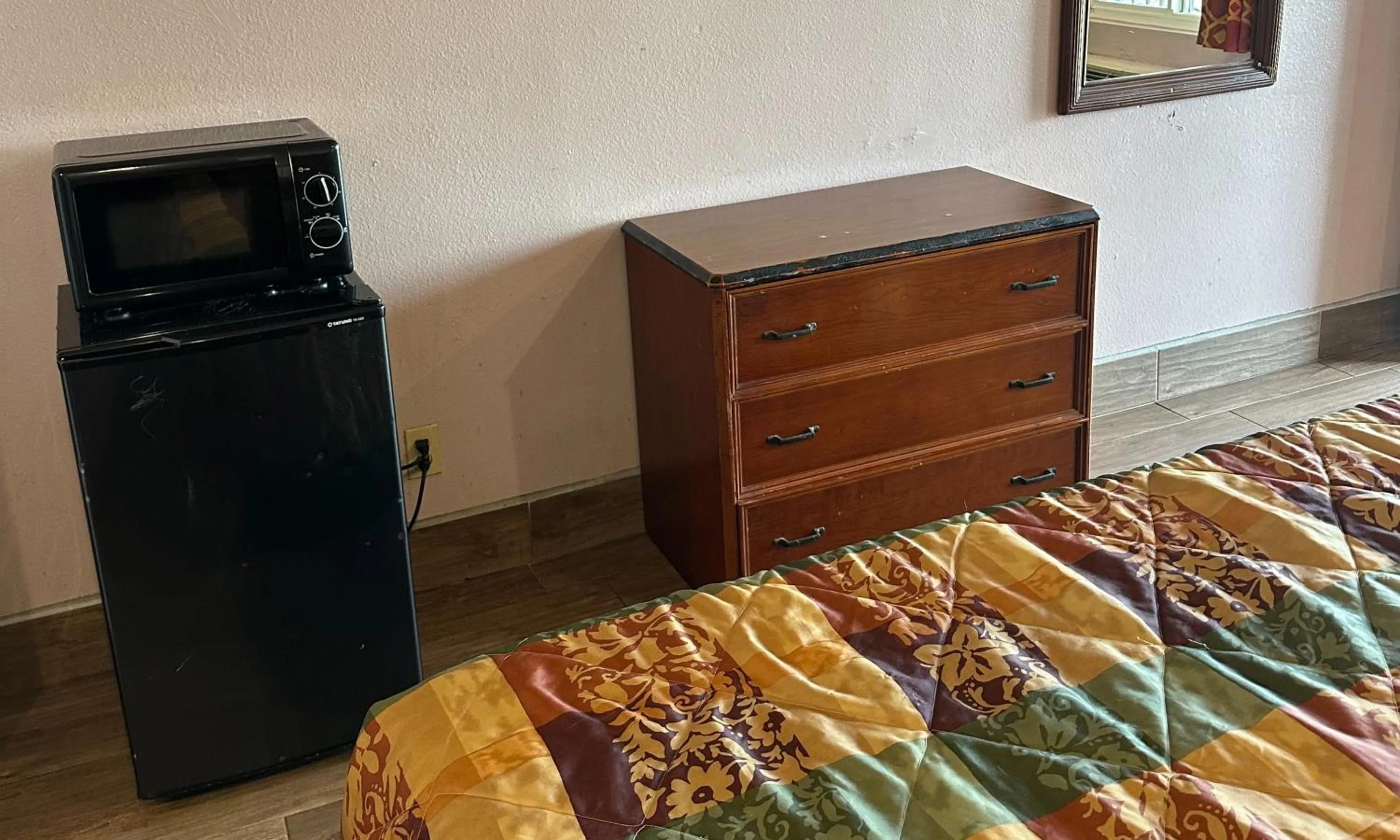 Bedroom in Heritage inn and suites
