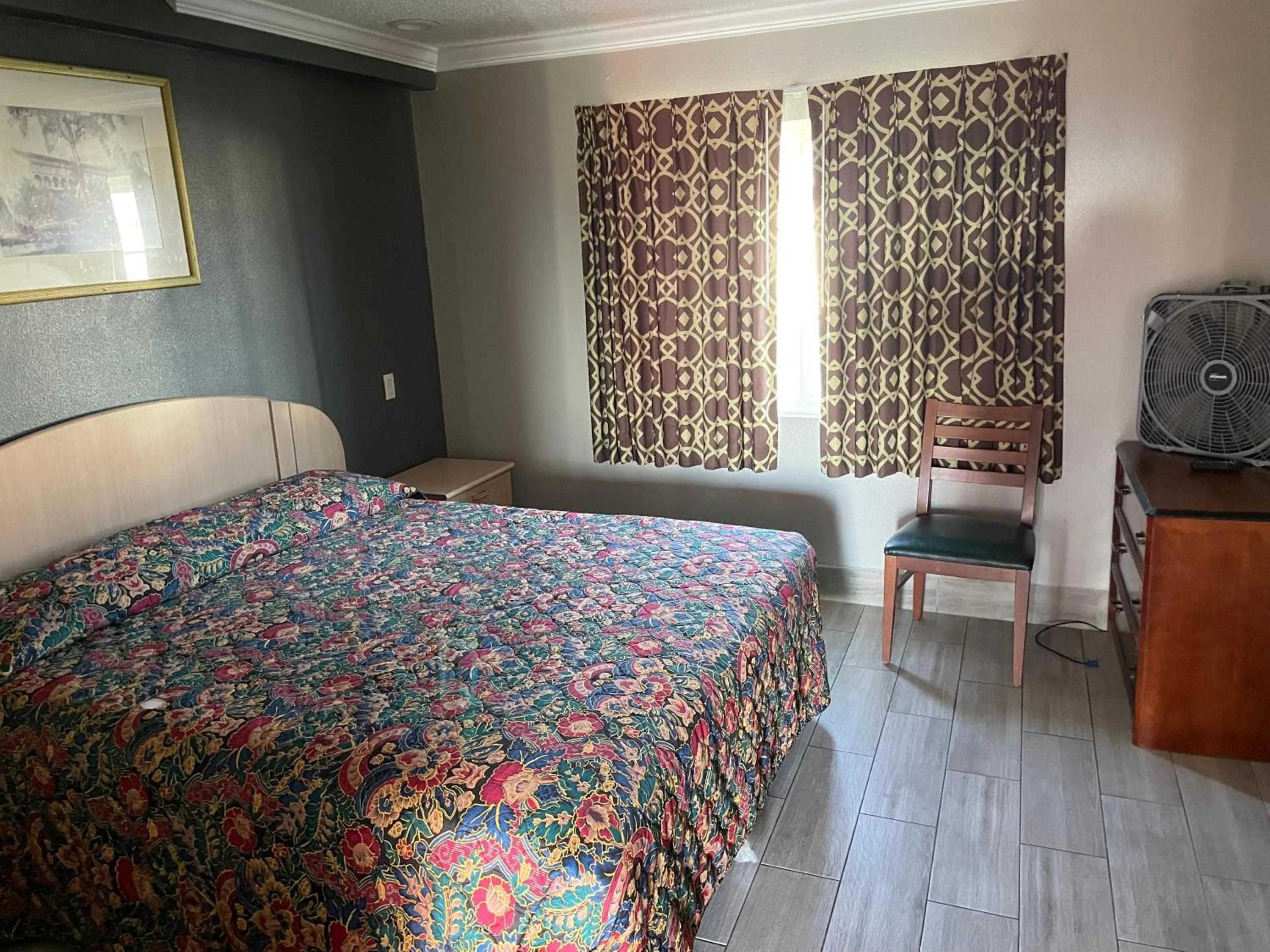 Bedroom in Heritage inn and suites