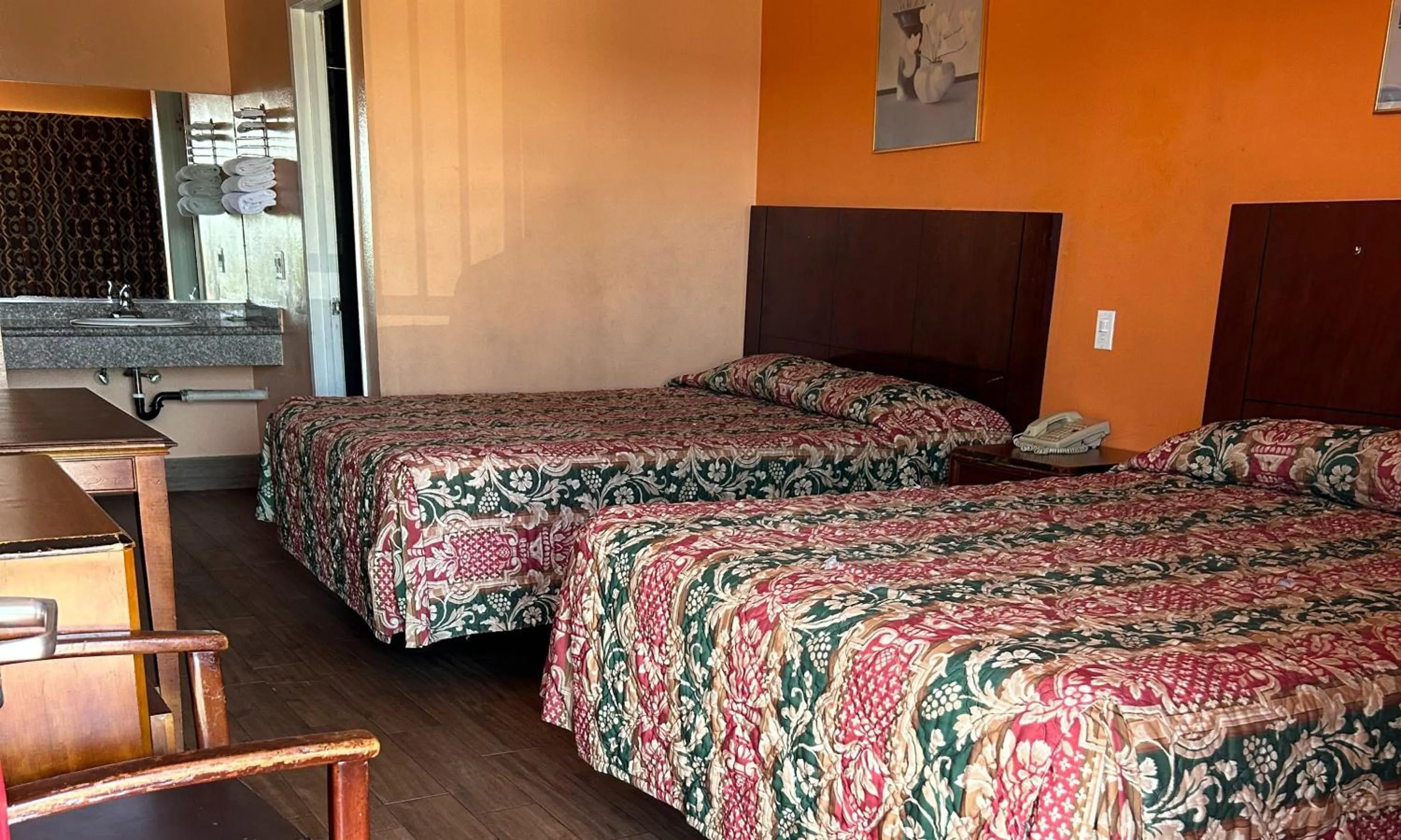 Bedroom in Heritage inn and suites