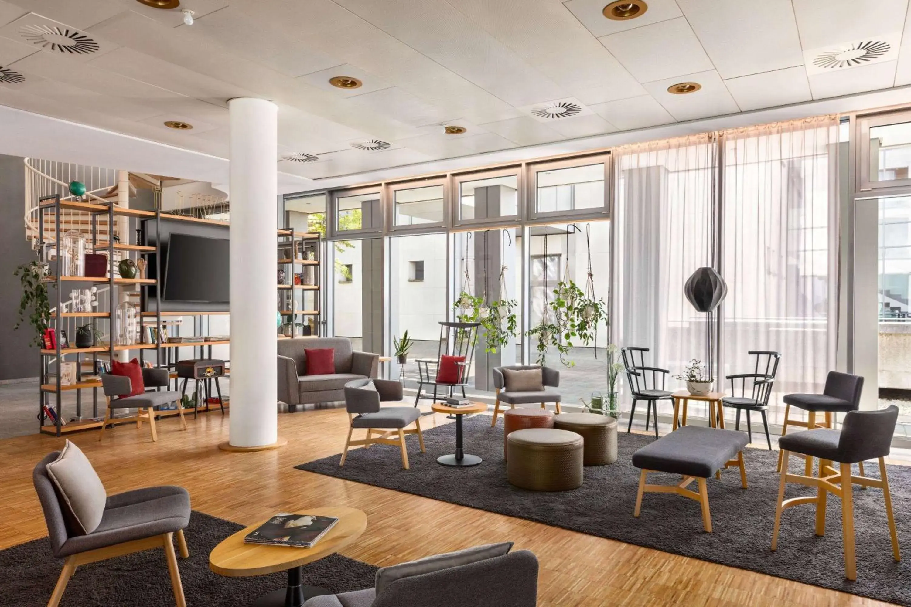 Lobby or reception in Vienna House Easy by Wyndham Trier Lobby or reception in Vienna House Easy by Wyndham Trier