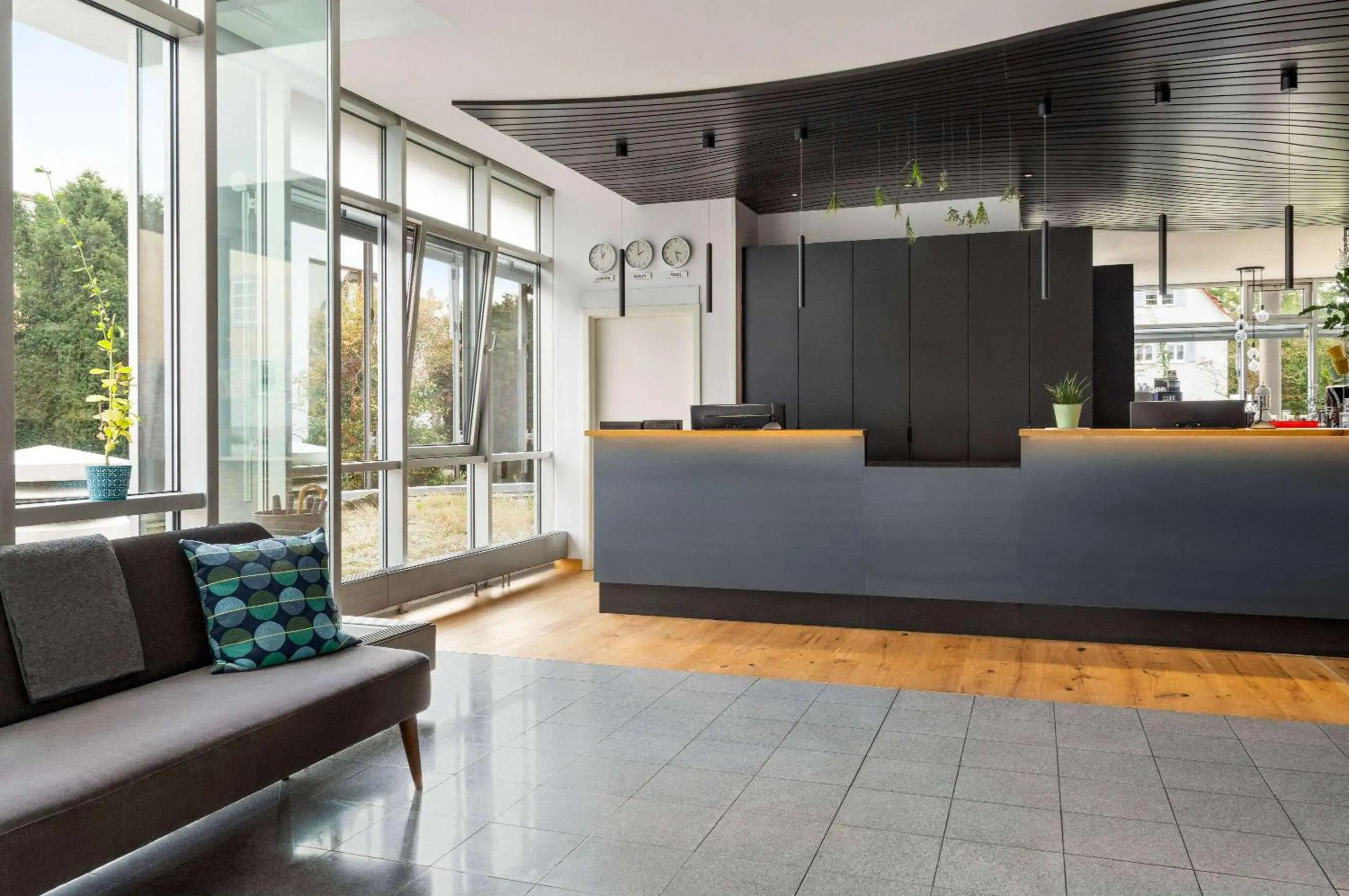 Lobby or reception in Vienna House Easy by Wyndham Günzburg Lobby or reception in Vienna House Easy by Wyndham Günzburg