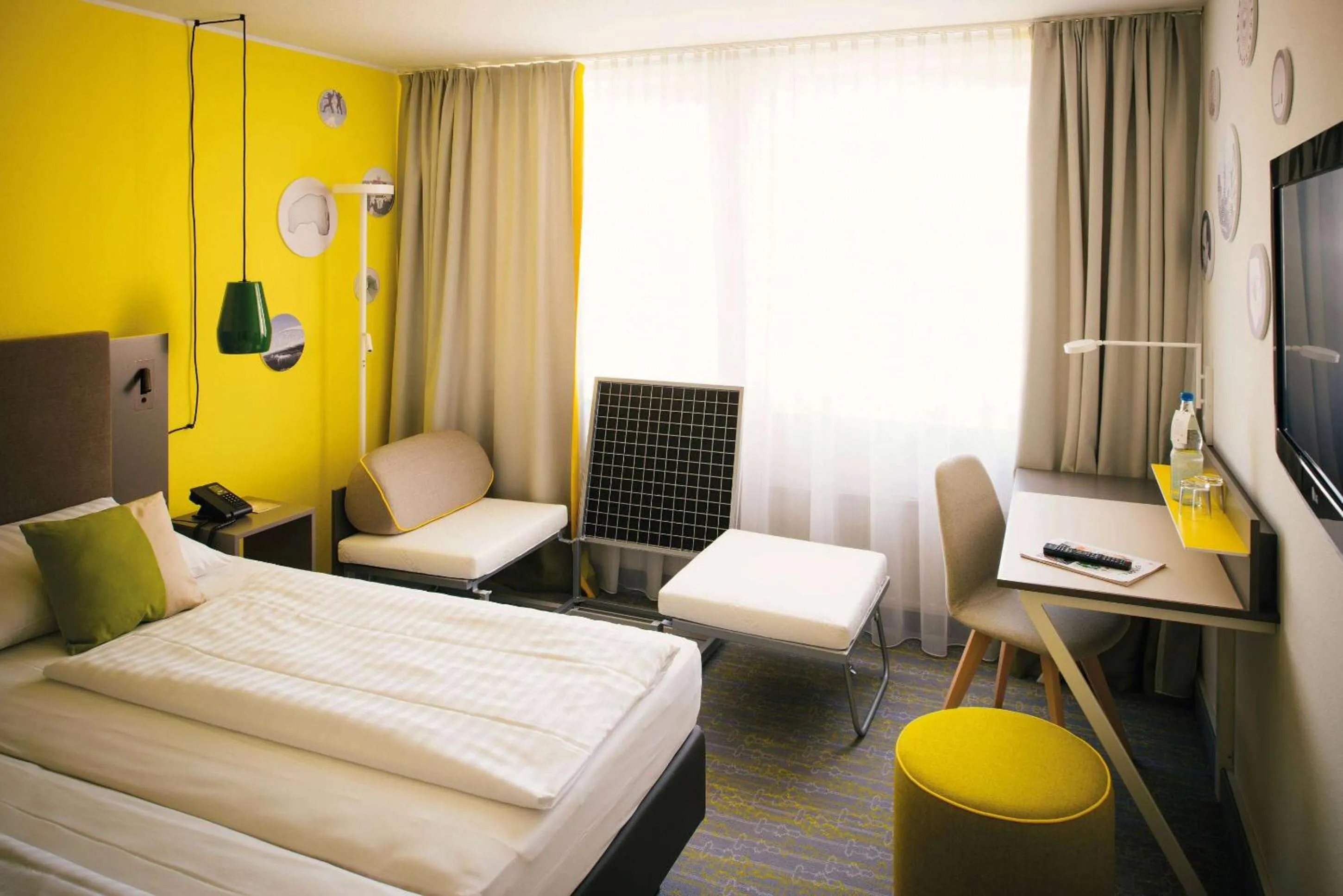 Photo of the whole room, Bed in Vienna House Easy by Wyndham Günzburg