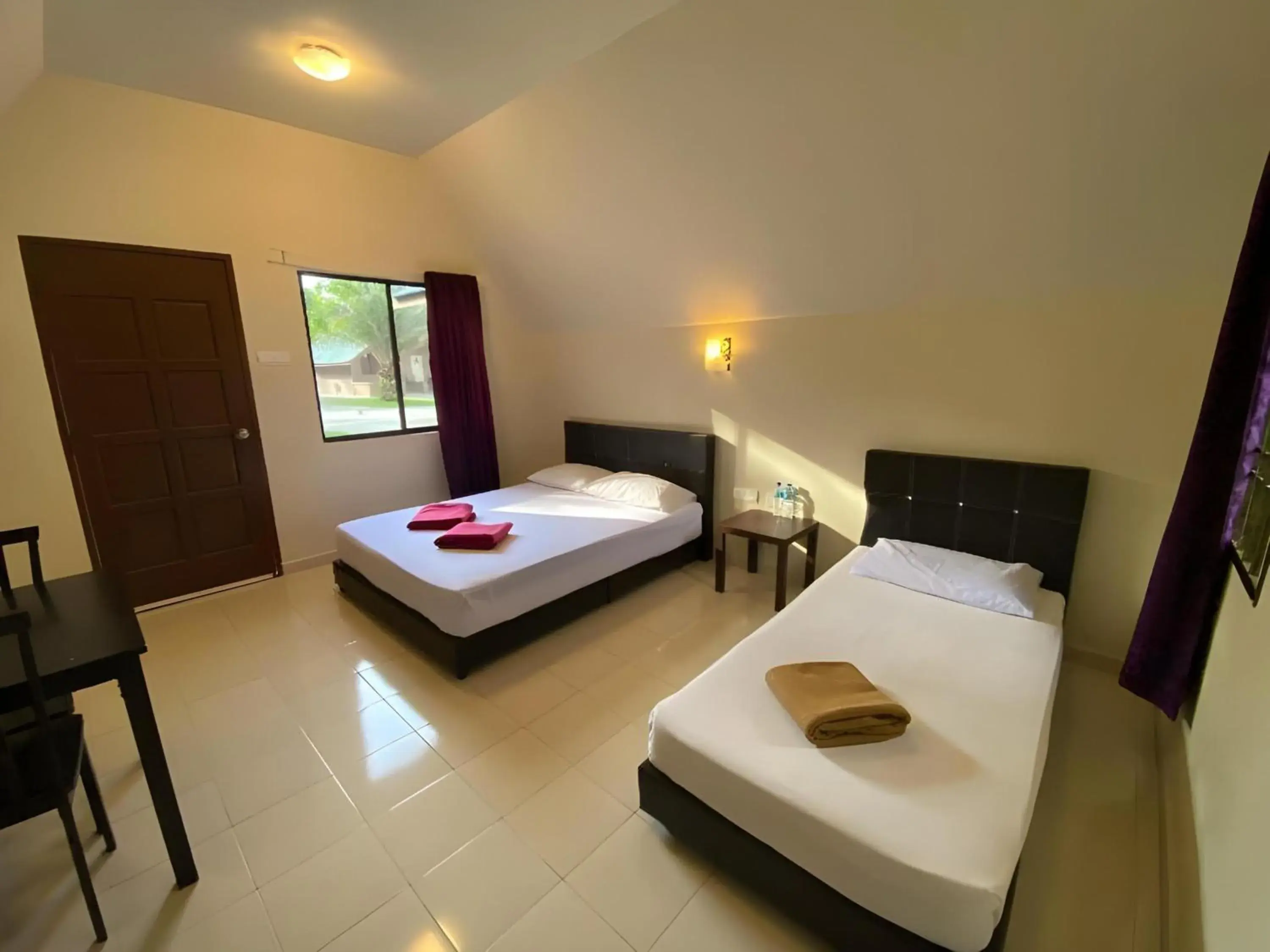 Photo of the whole room, Bed in Hotel O Sedili Inn Resort Photo of the whole room, Bed in Hotel O Sedili Inn Resort