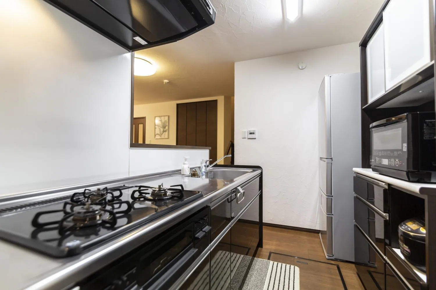 Kitchen or kitchenette in Ocean Front Maezato