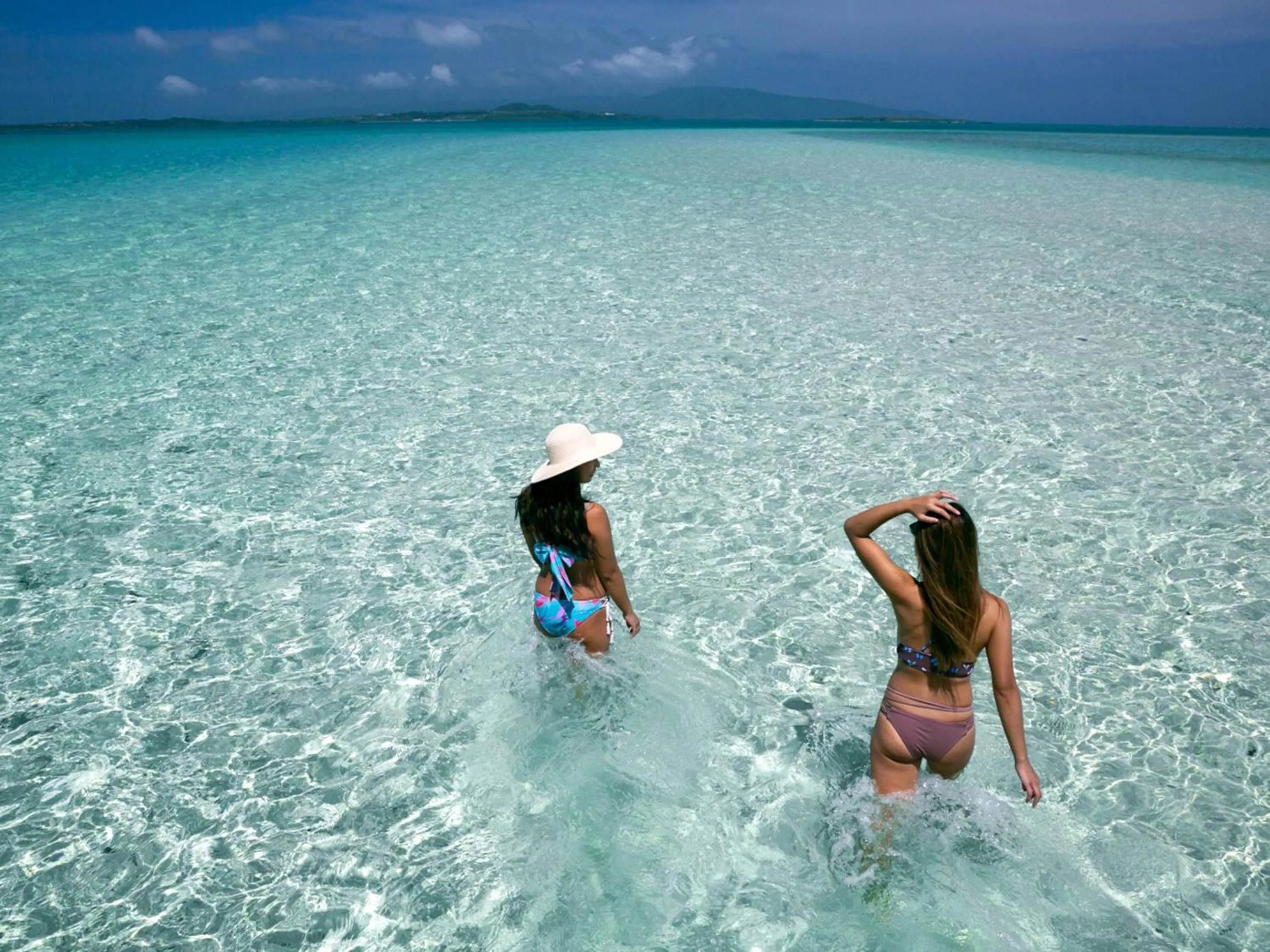 People in Ocean Front Maezato