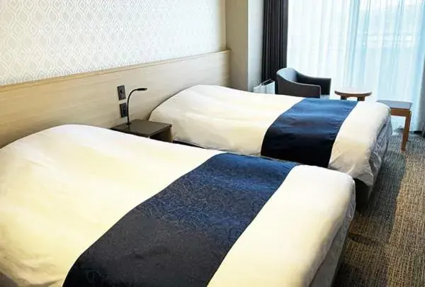 Bed in Hotel Abest Grande Takatsuki Bed in Hotel Abest Grande Takatsuki