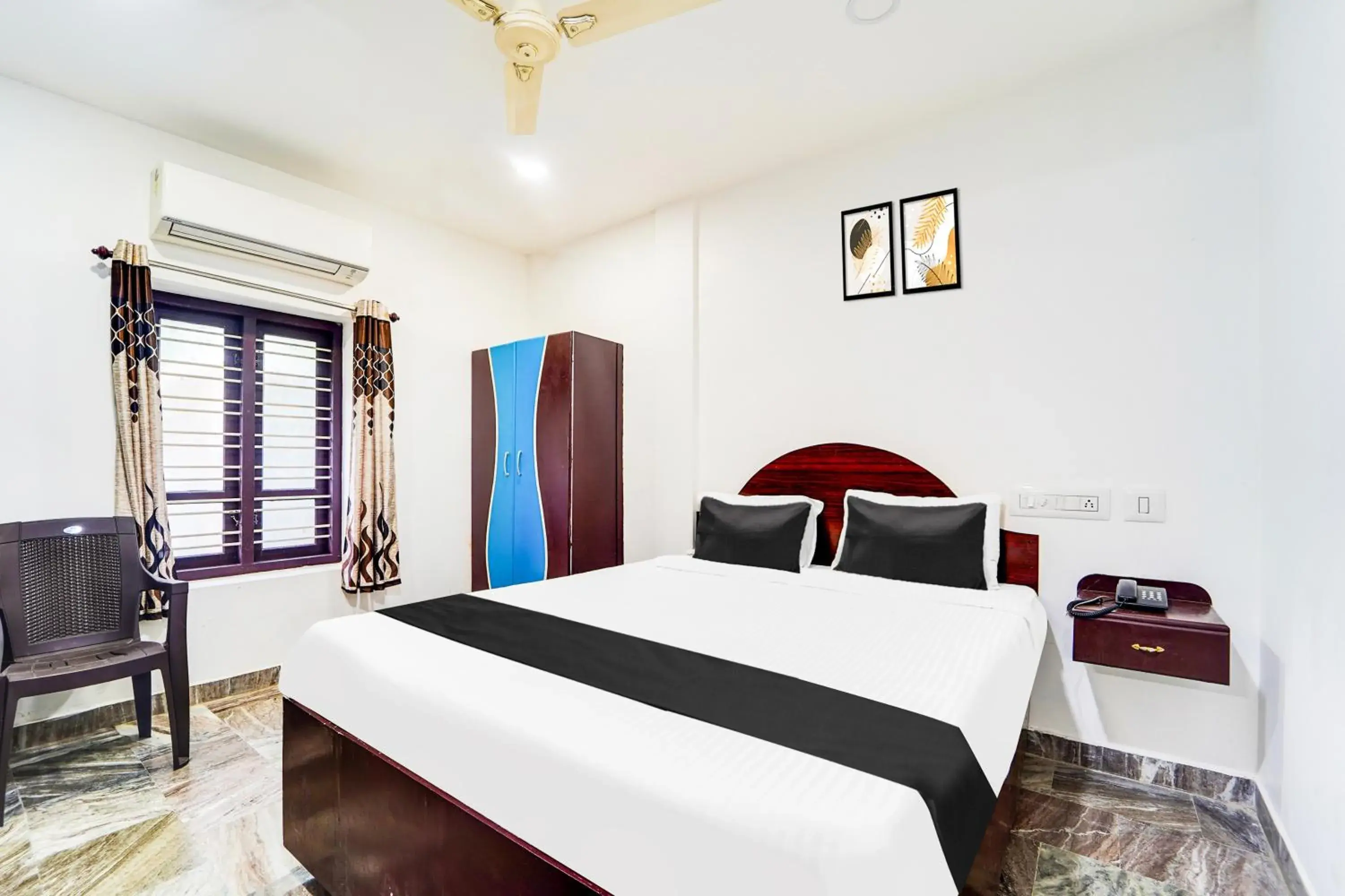 Bedroom, Bed in Super Hotel O Kanyakumari Near Sunrise View formerly Jaisas Paradise Bedroom, Bed in Super Hotel O Kanyakumari Near Sunrise View formerly Jaisas Paradise