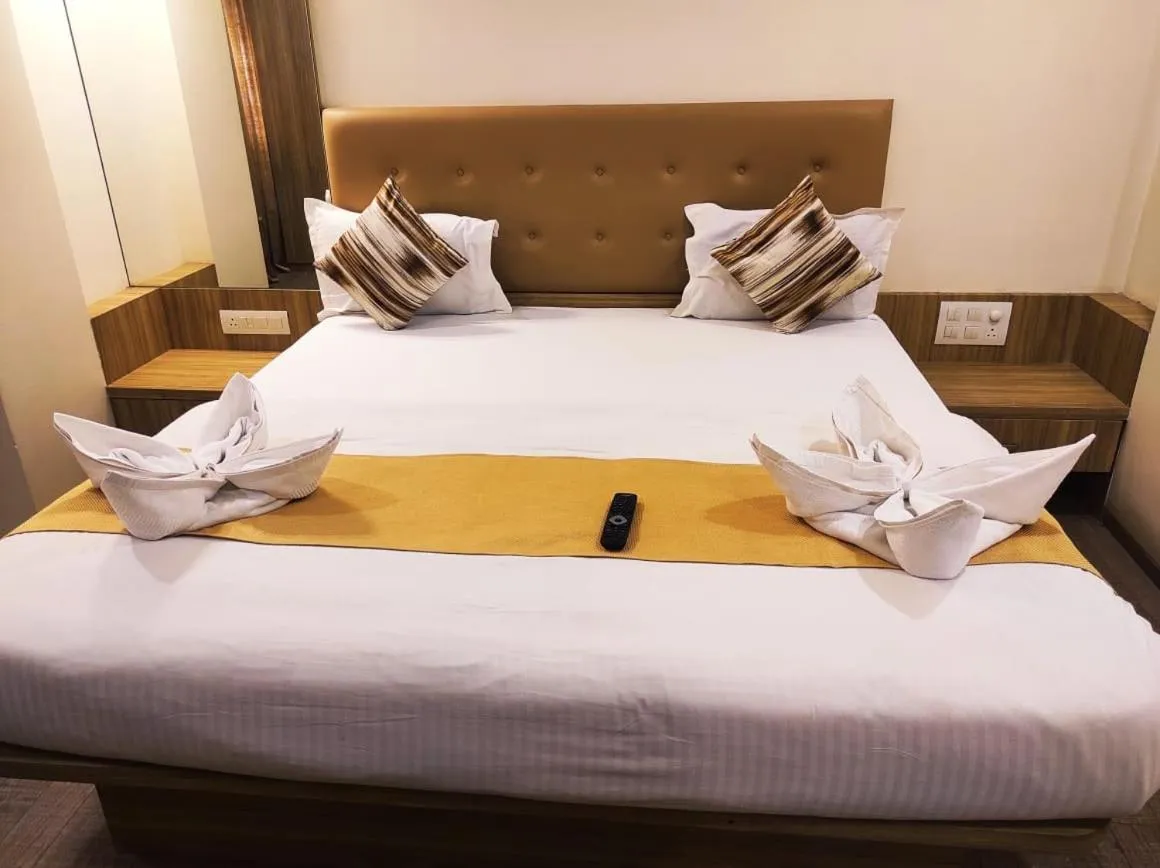 Bed in Hotel Manasi Royal