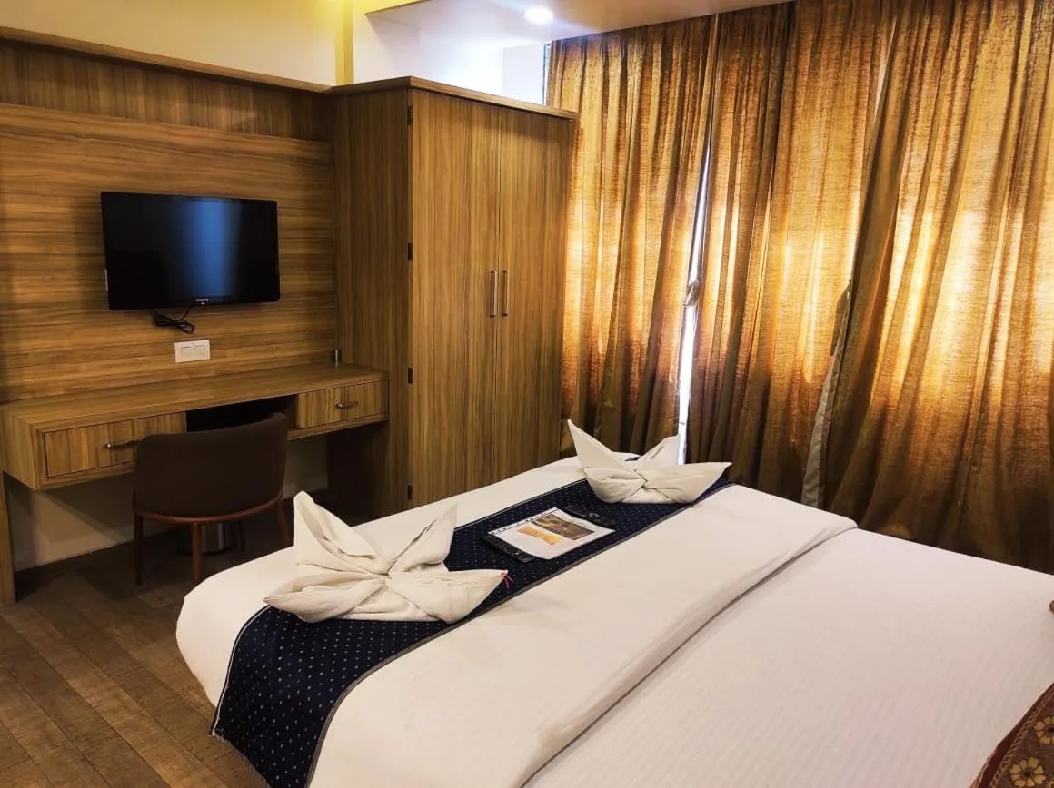 Bed in Hotel Manasi Royal