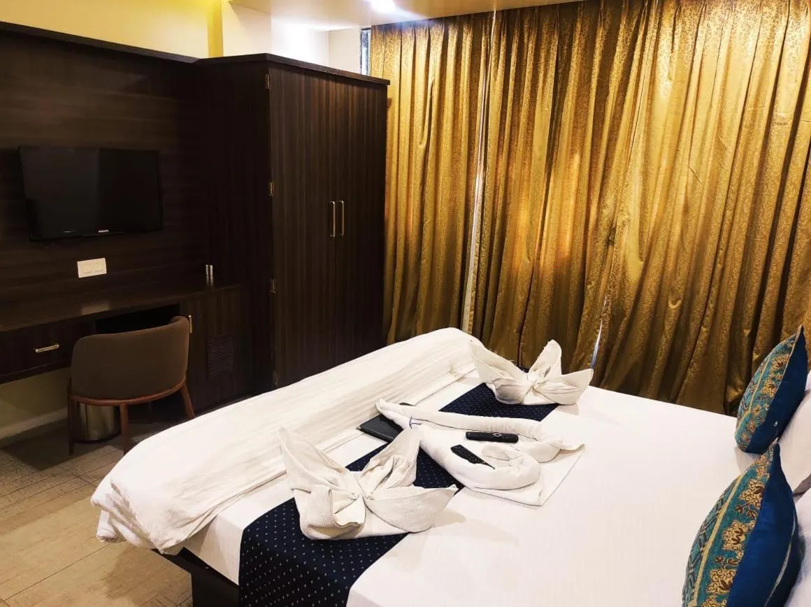 Bed in Hotel Manasi Royal