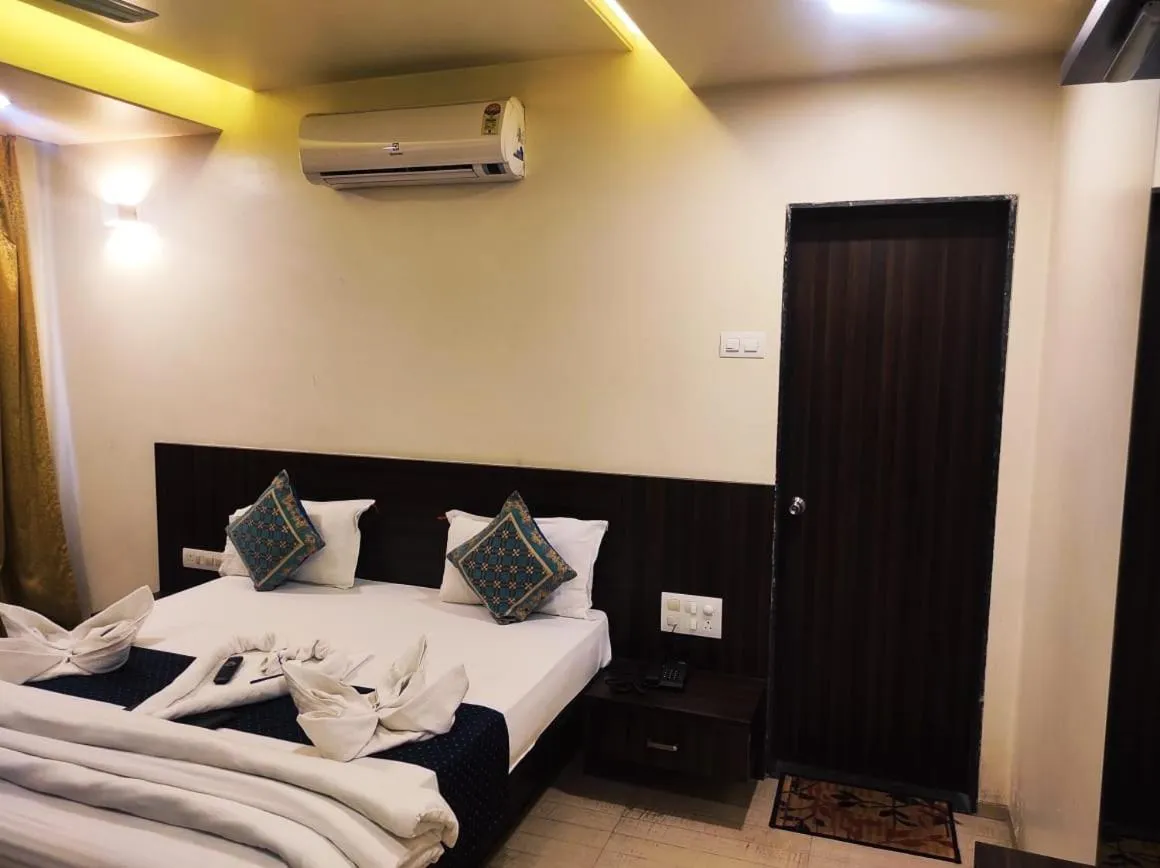 Bed in Hotel Manasi Royal