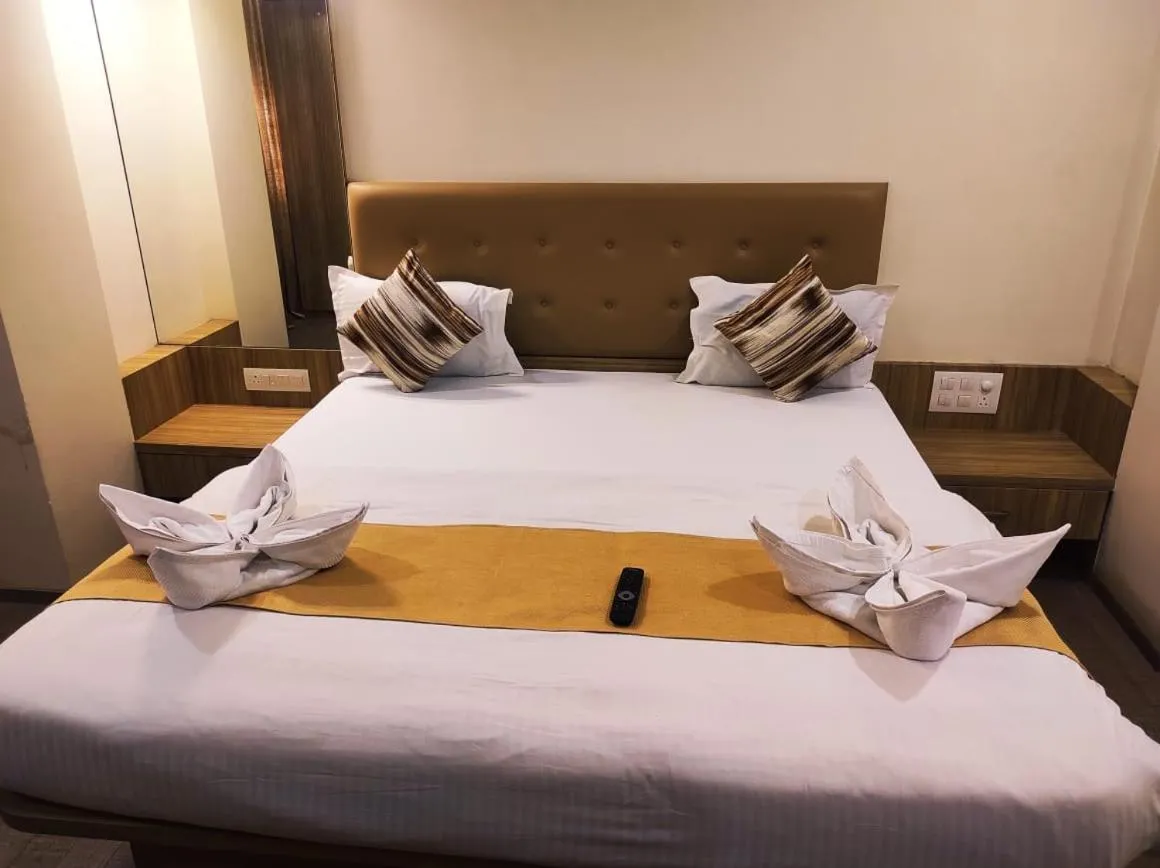 Bed in Hotel Manasi Royal