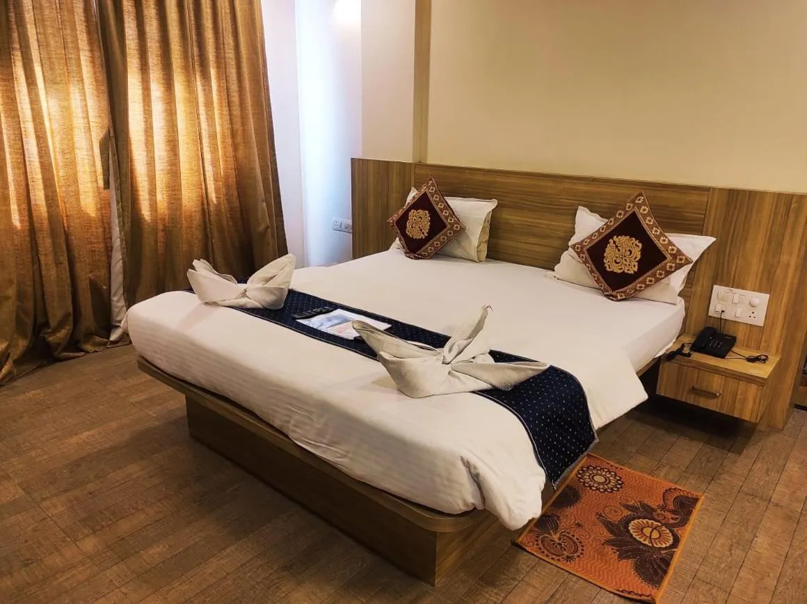 Bed in Hotel Manasi Royal