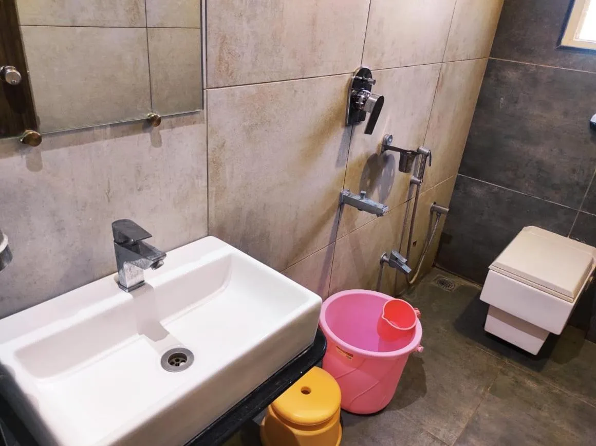 Bathroom in Hotel Manasi INN