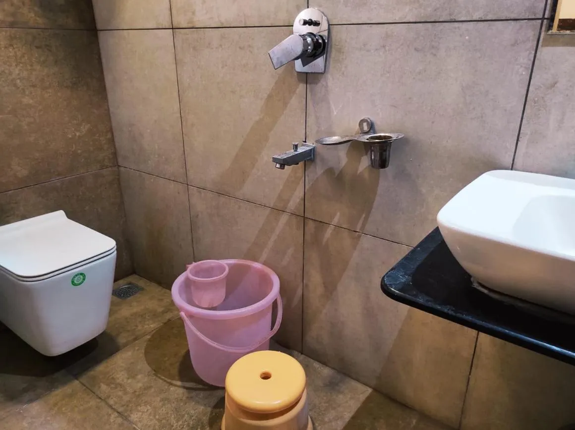 Bathroom in Hotel Manasi INN