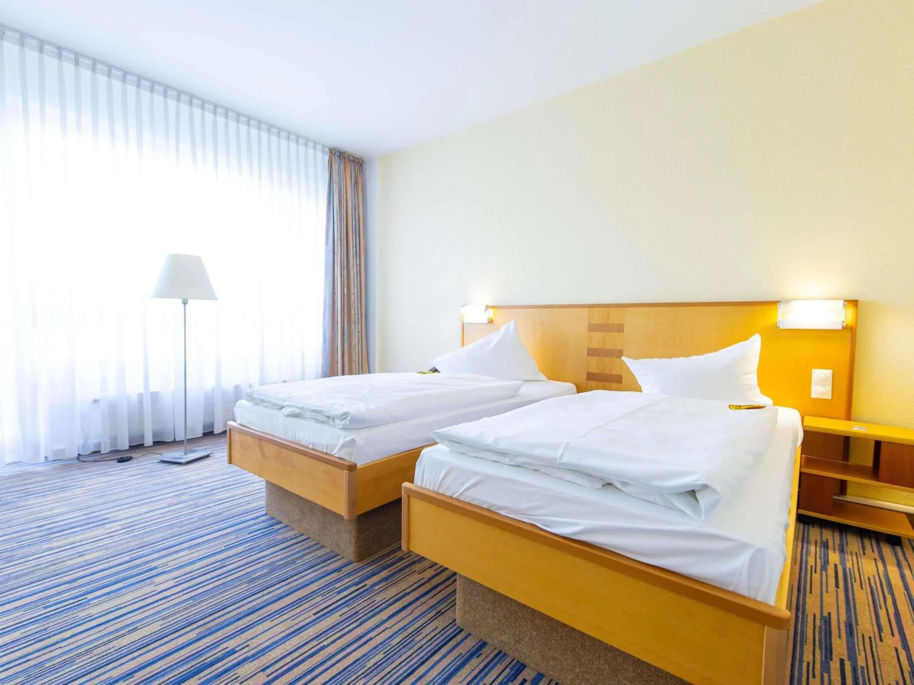 Bedroom, Bed in Mercure Hotel Riesa Dresden Elbland Bedroom, Bed in Mercure Hotel Riesa Dresden Elbland