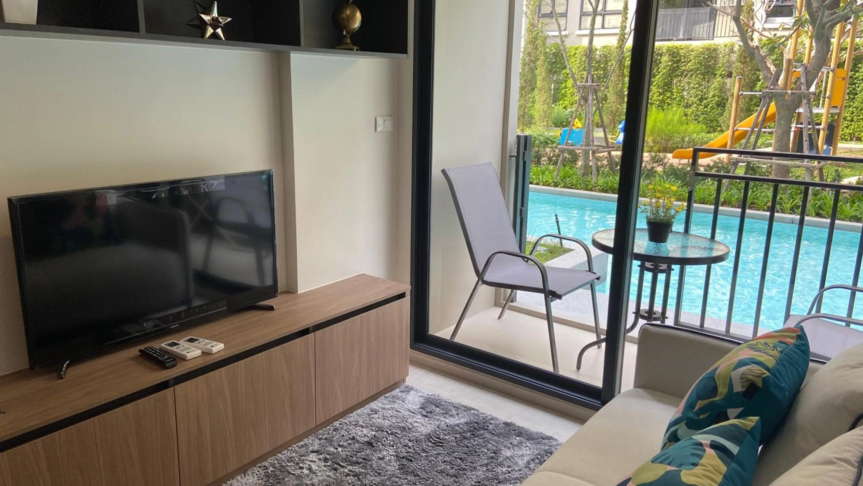 TV and multimedia in La Casita pool access condo HuaHin