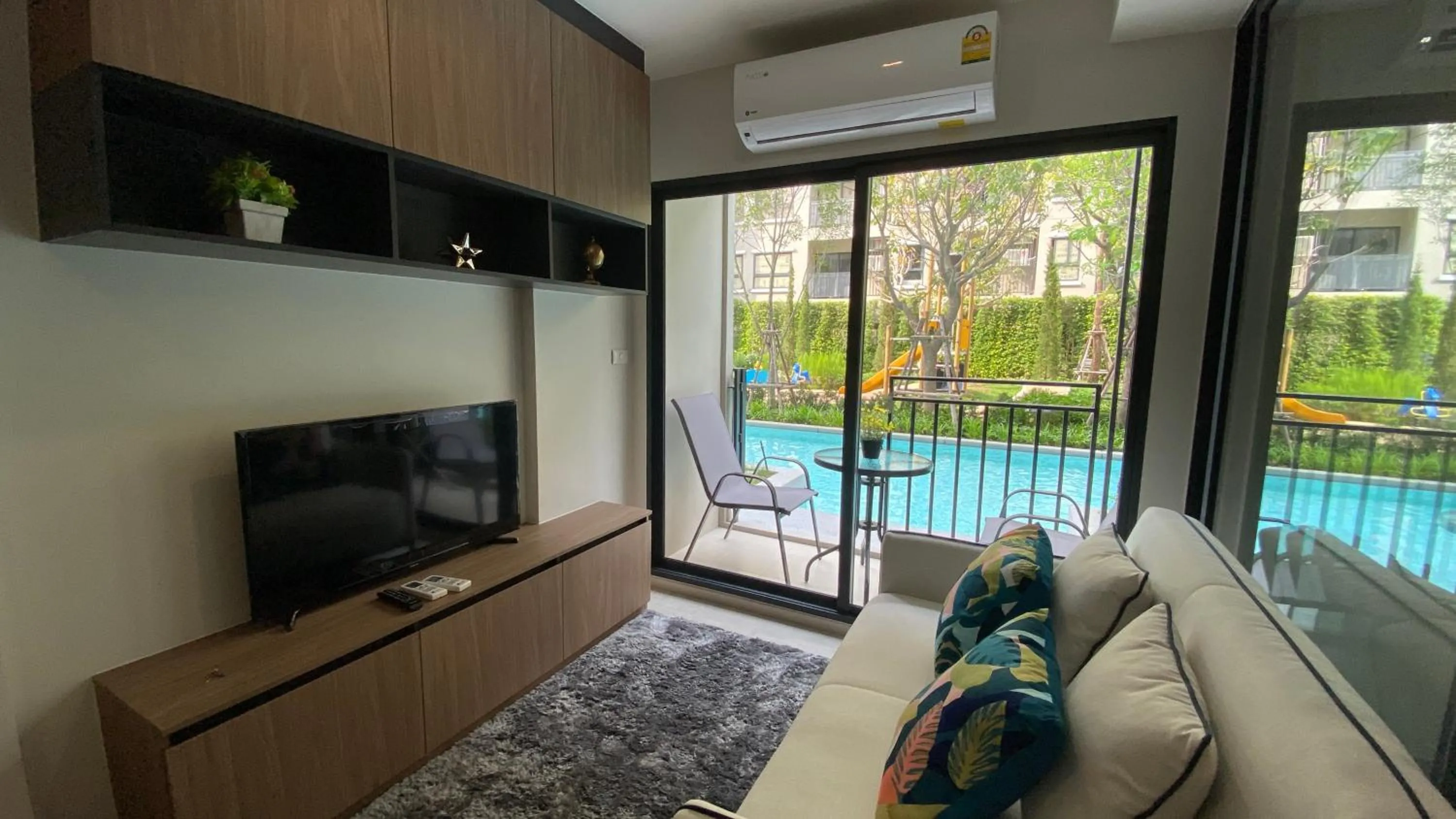 TV and multimedia in La Casita pool access condo HuaHin