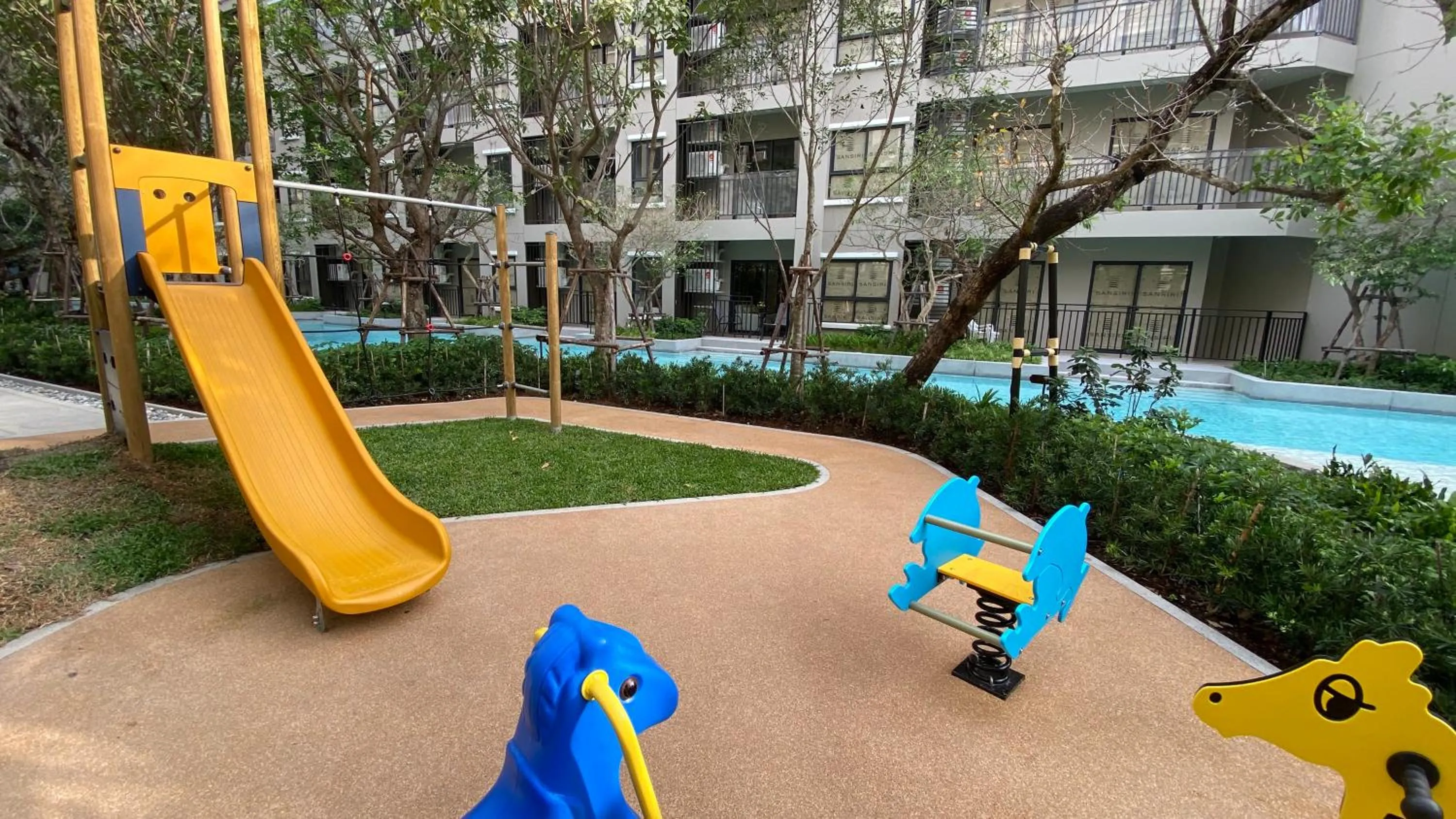 Children play ground in La Casita pool access condo HuaHin