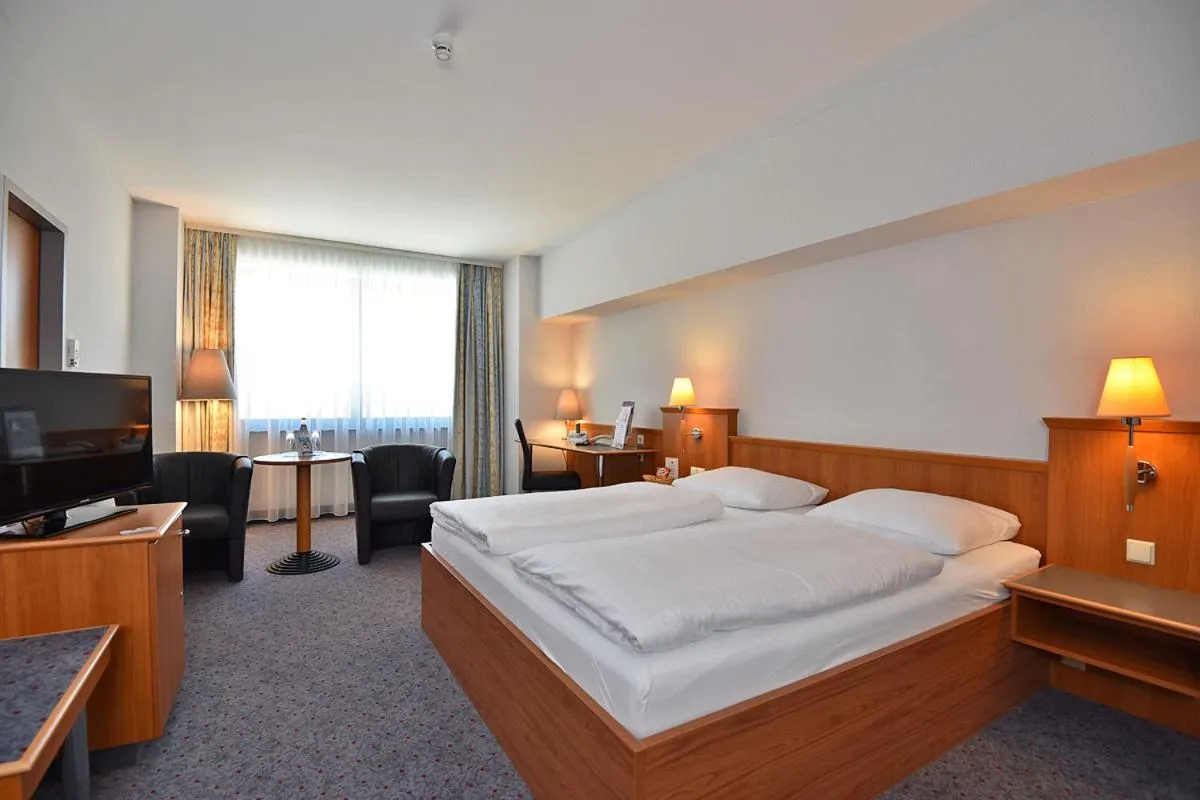 Photo of the whole room, Bed in City Hotel Suhl