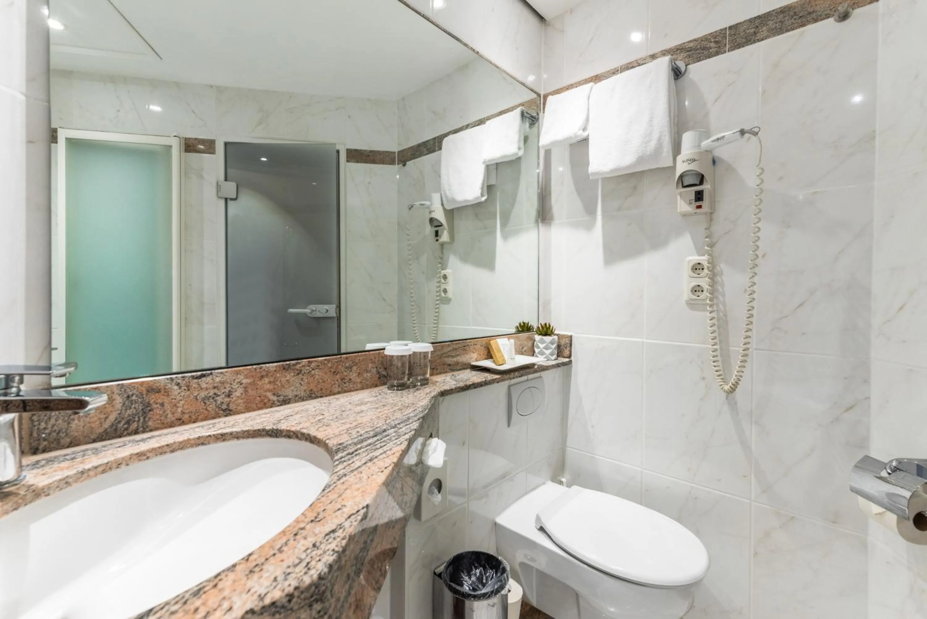 Bathroom in KING's Hotel First