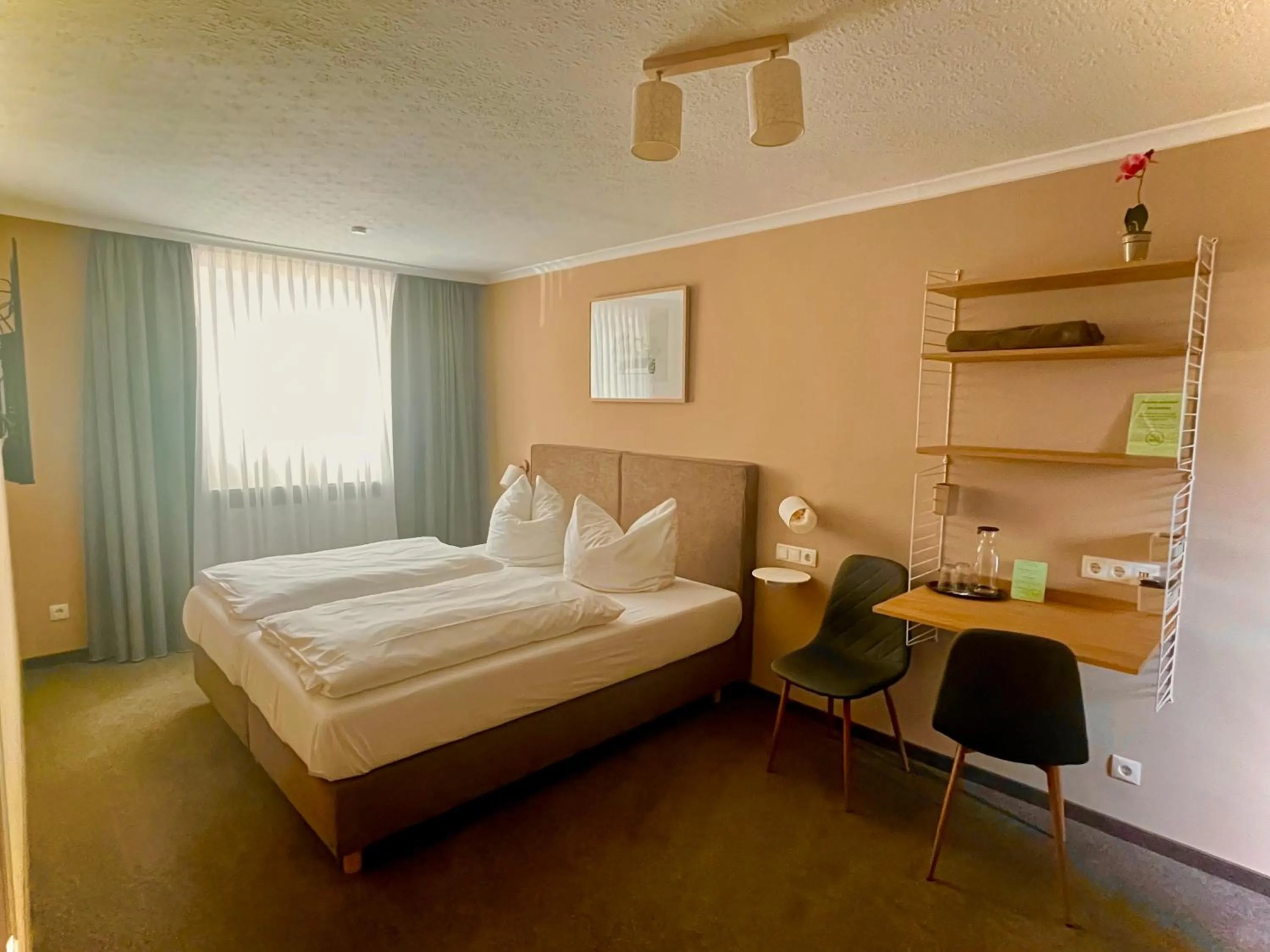 Bed in Kocks Hotel Garni