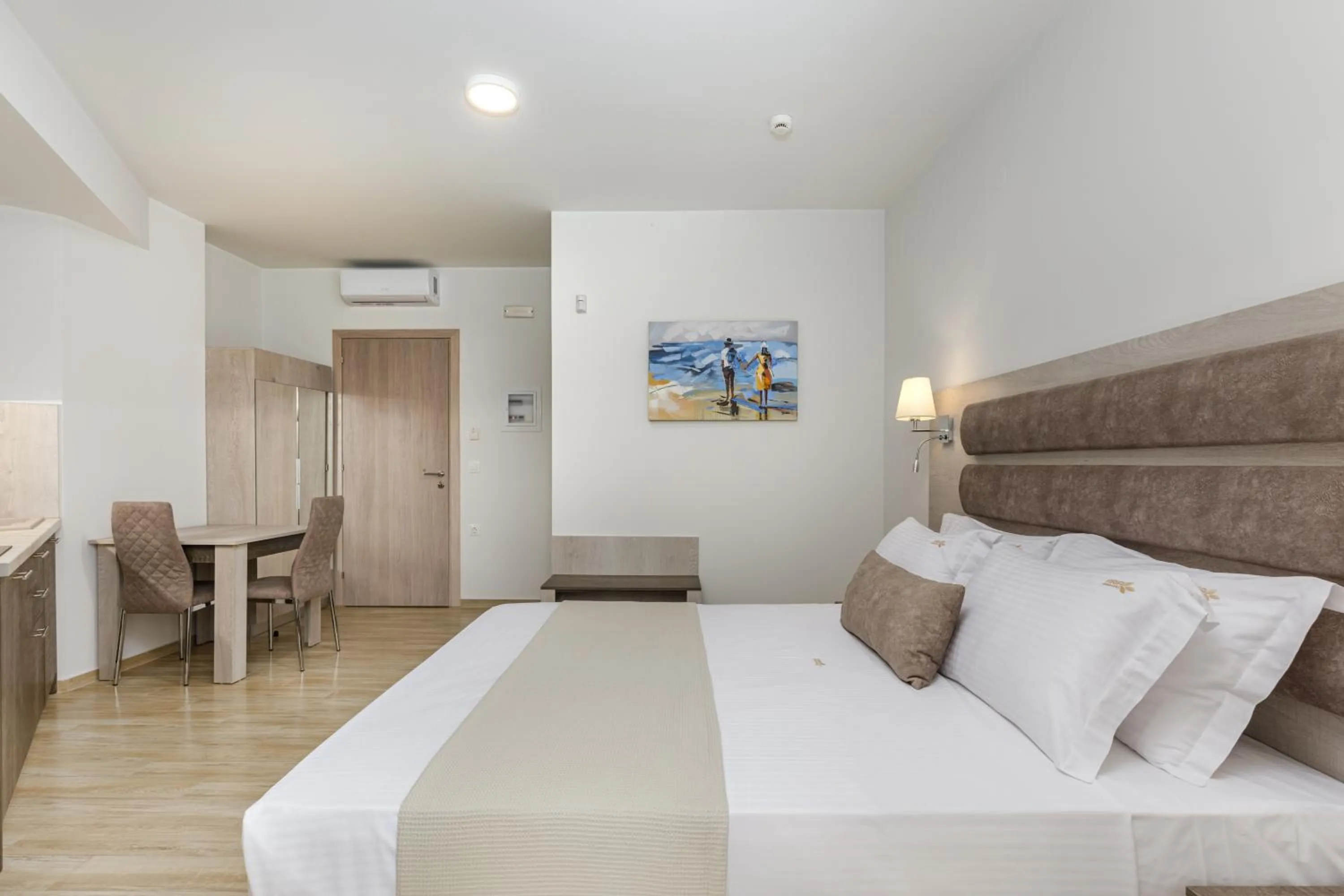 Bed in Aria Garden Suites