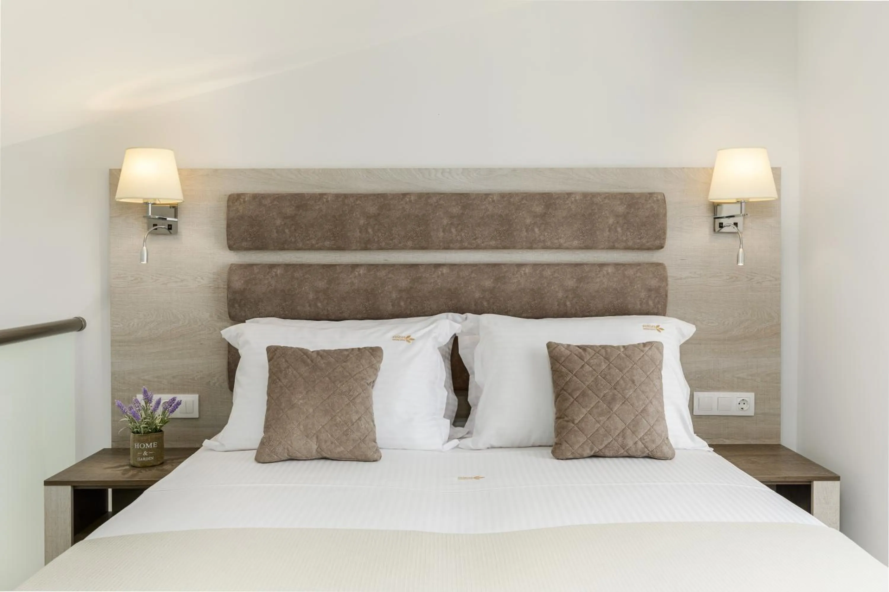 Bed in Aria Garden Suites