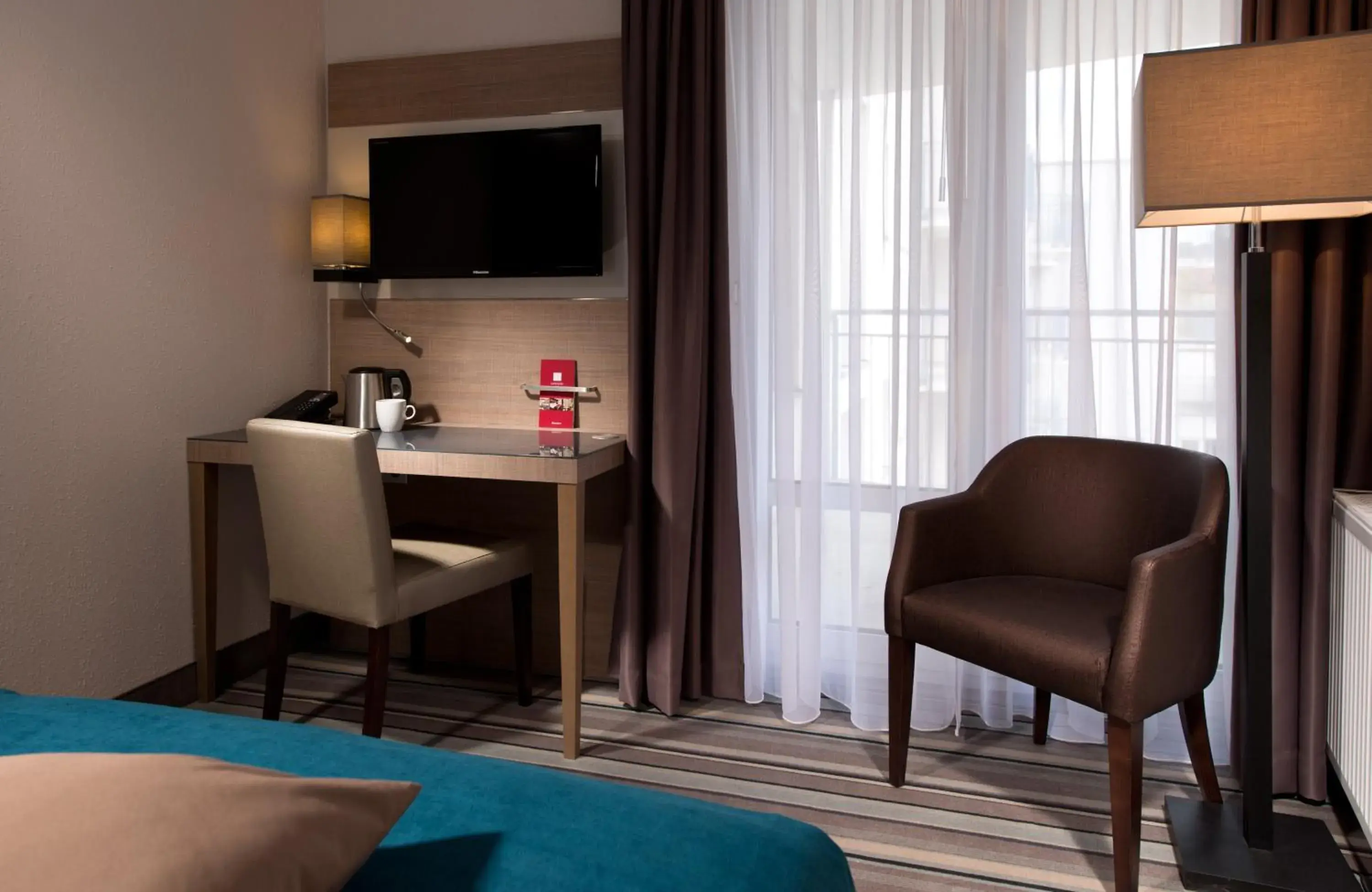 Photo of the whole room, Bed in Leonardo Hotel Munich City Olympiapark Photo of the whole room, Bed in Leonardo Hotel Munich City Olympiapark