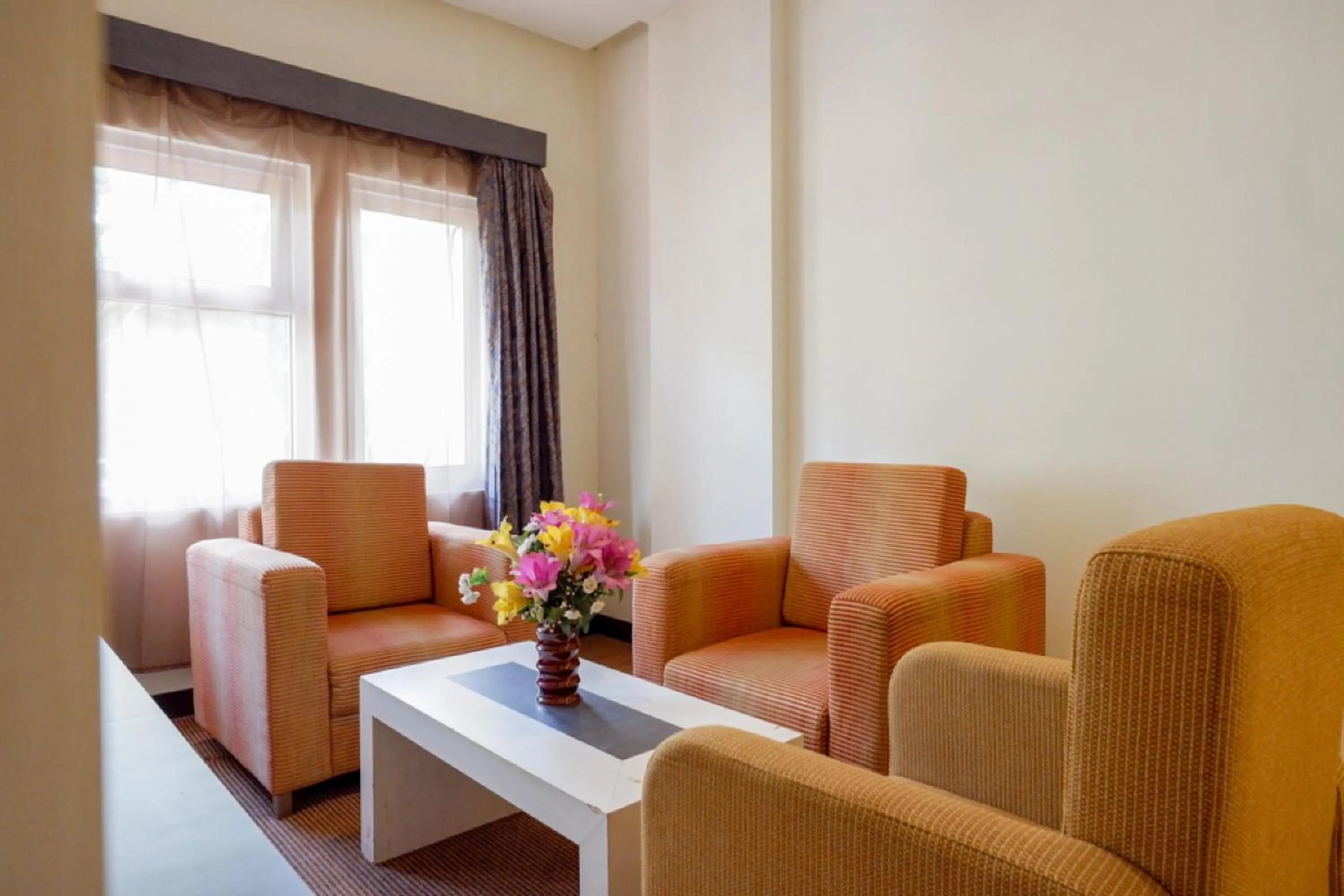 Seating area in RedDoorz Plus near Hotel Benua Kendari