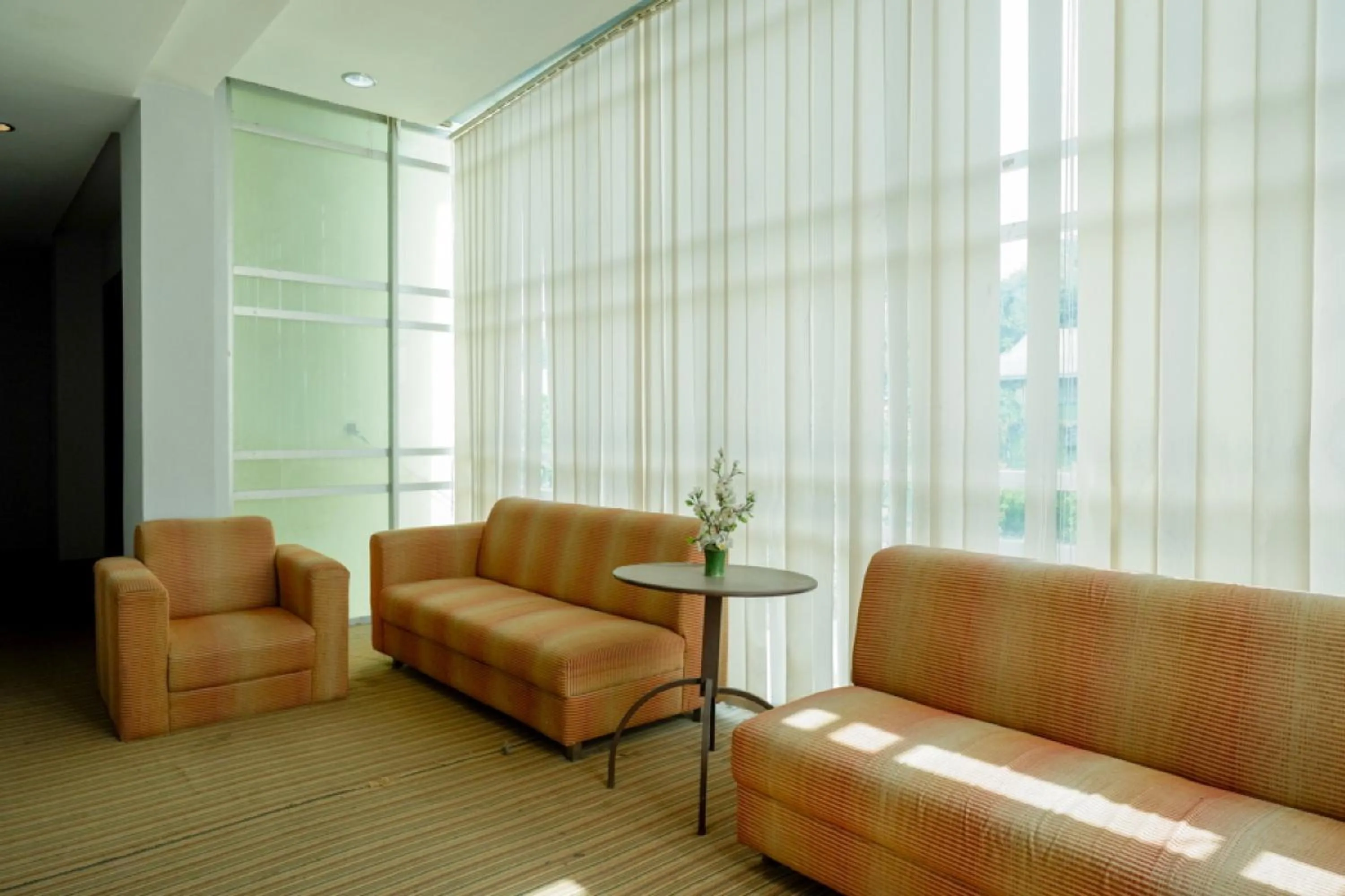 Seating area in RedDoorz Plus near Hotel Benua Kendari