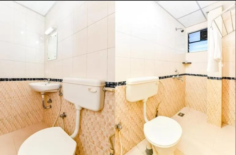 Bathroom in Hotel Tri-Star Residency