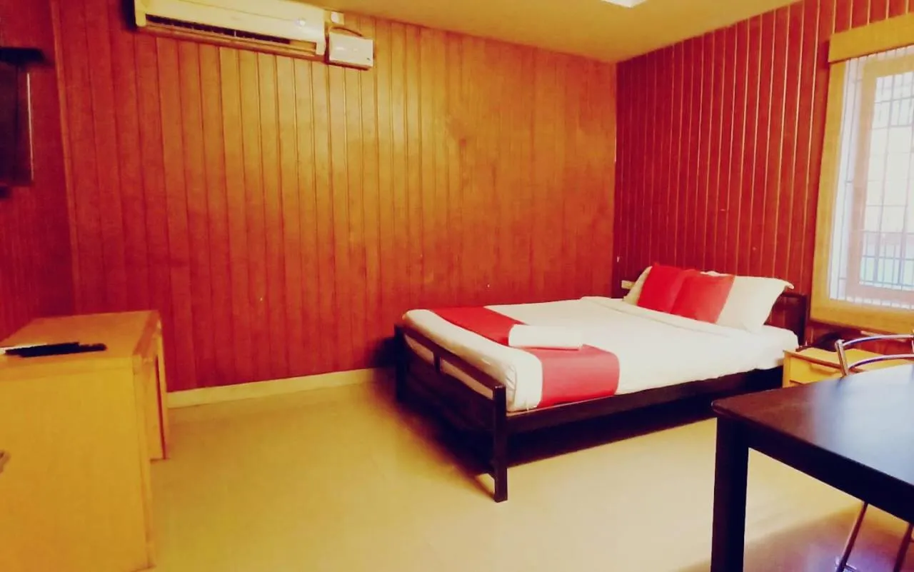 Bed in Hotel Tri-Star Residency