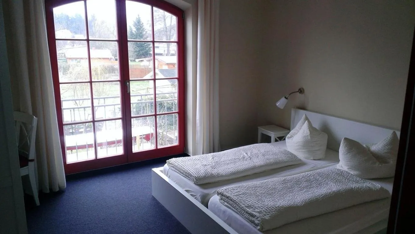 Photo of the whole room, Bed in Kulturgasthof Alte Reederei