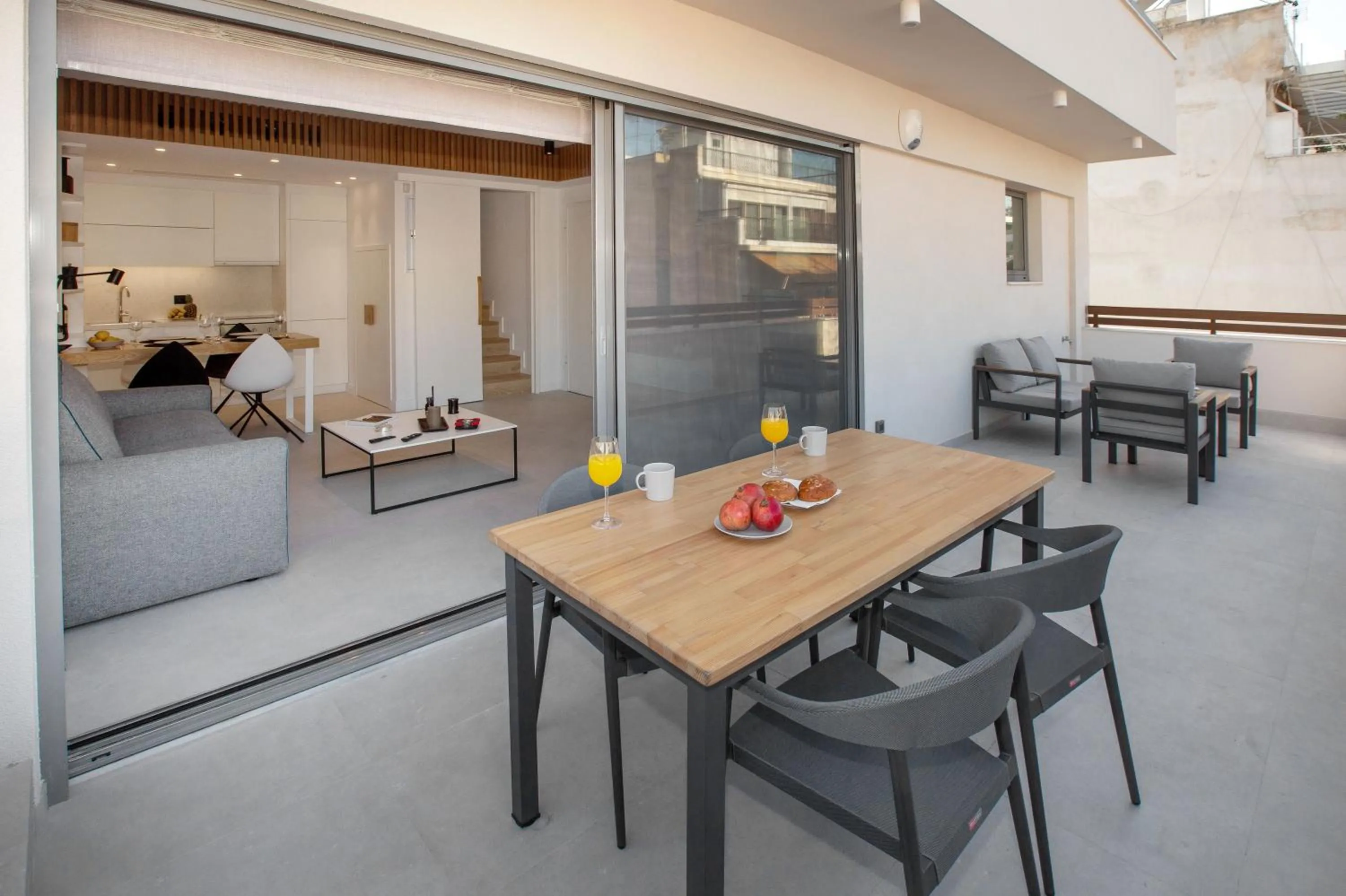 Dining area in Acropolis Golden Suites by GHH