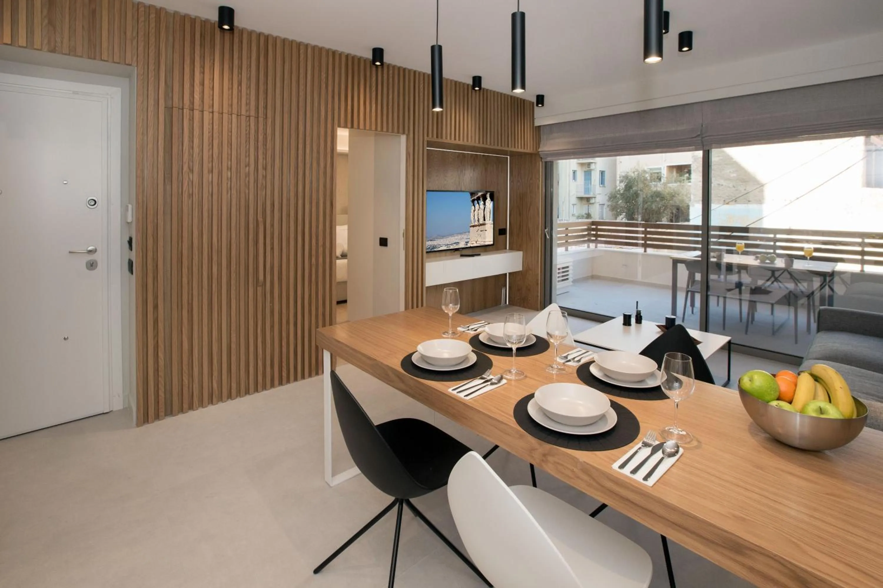 Dining area in Acropolis Golden Suites by GHH