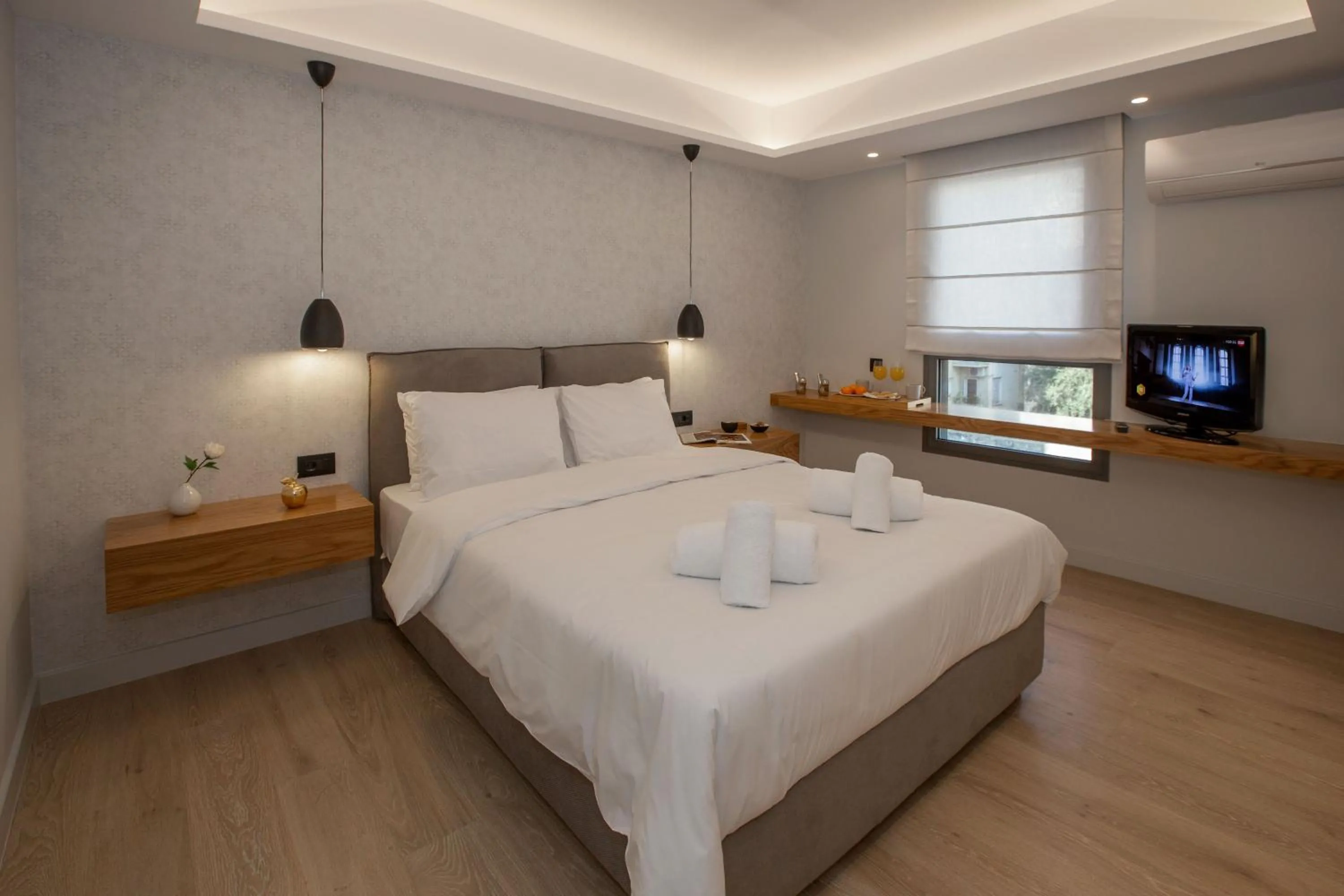 Bed in Acropolis Golden Suites by GHH