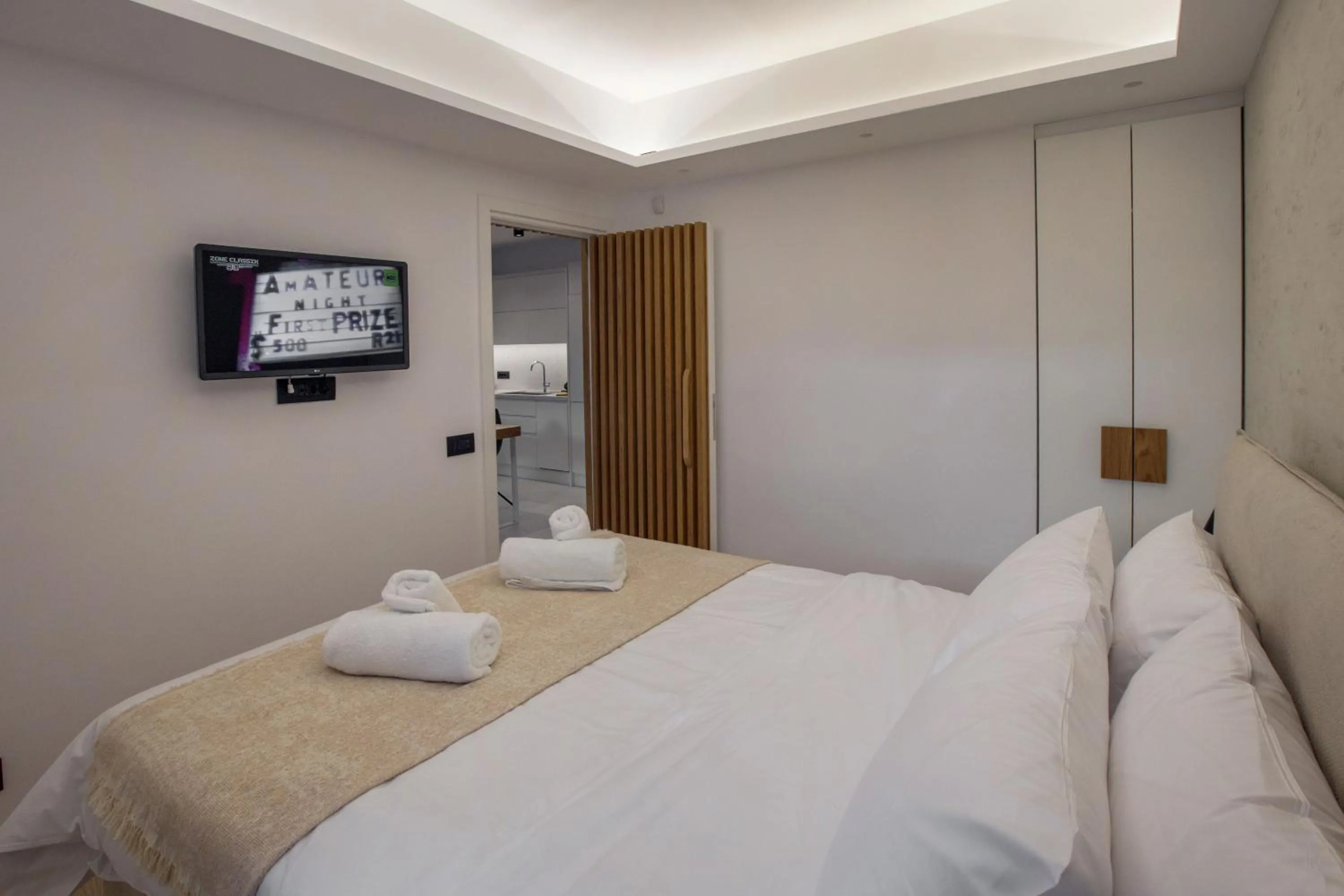 Bed in Acropolis Golden Suites by GHH