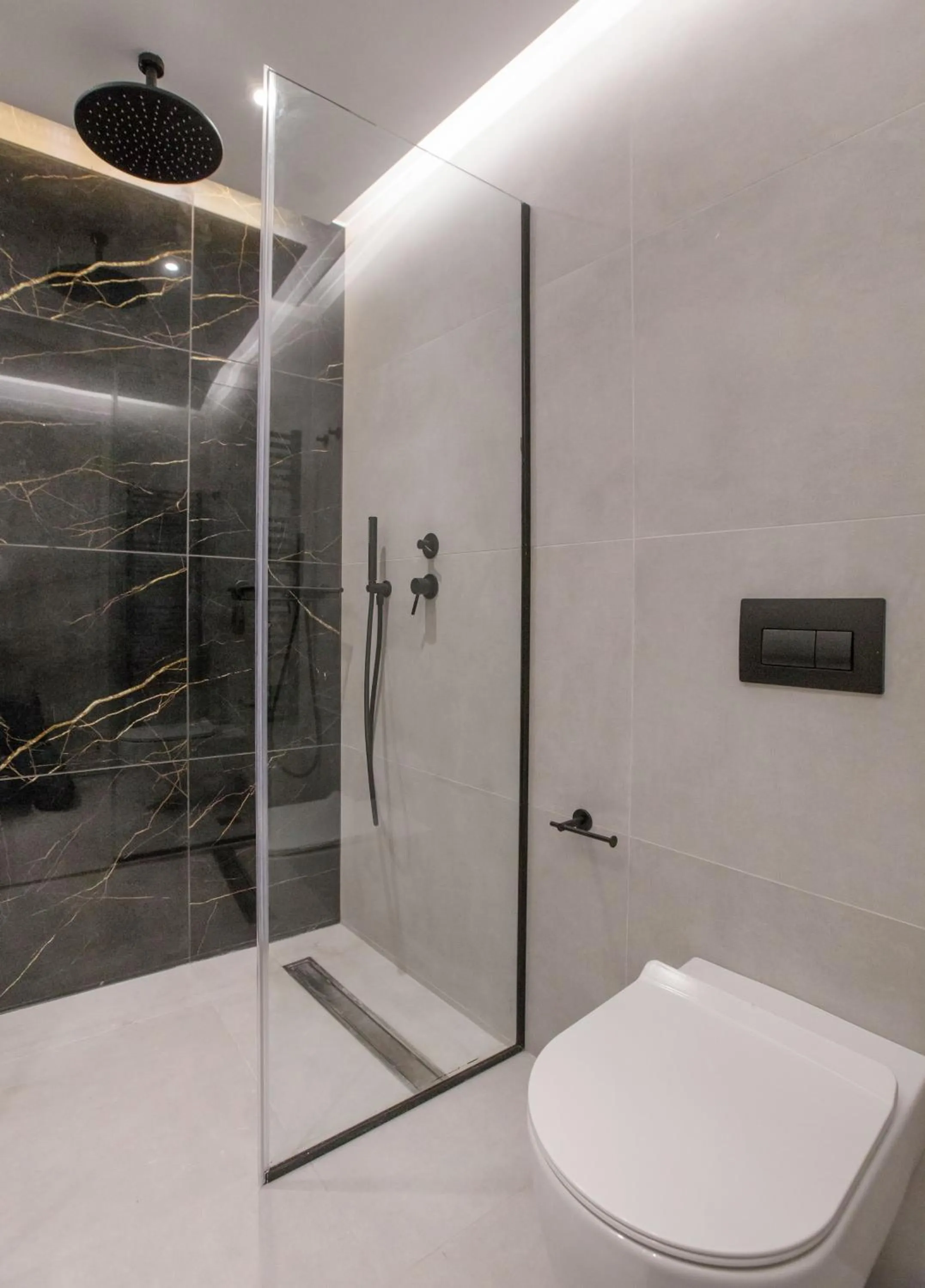 Bathroom in Acropolis Golden Suites by GHH