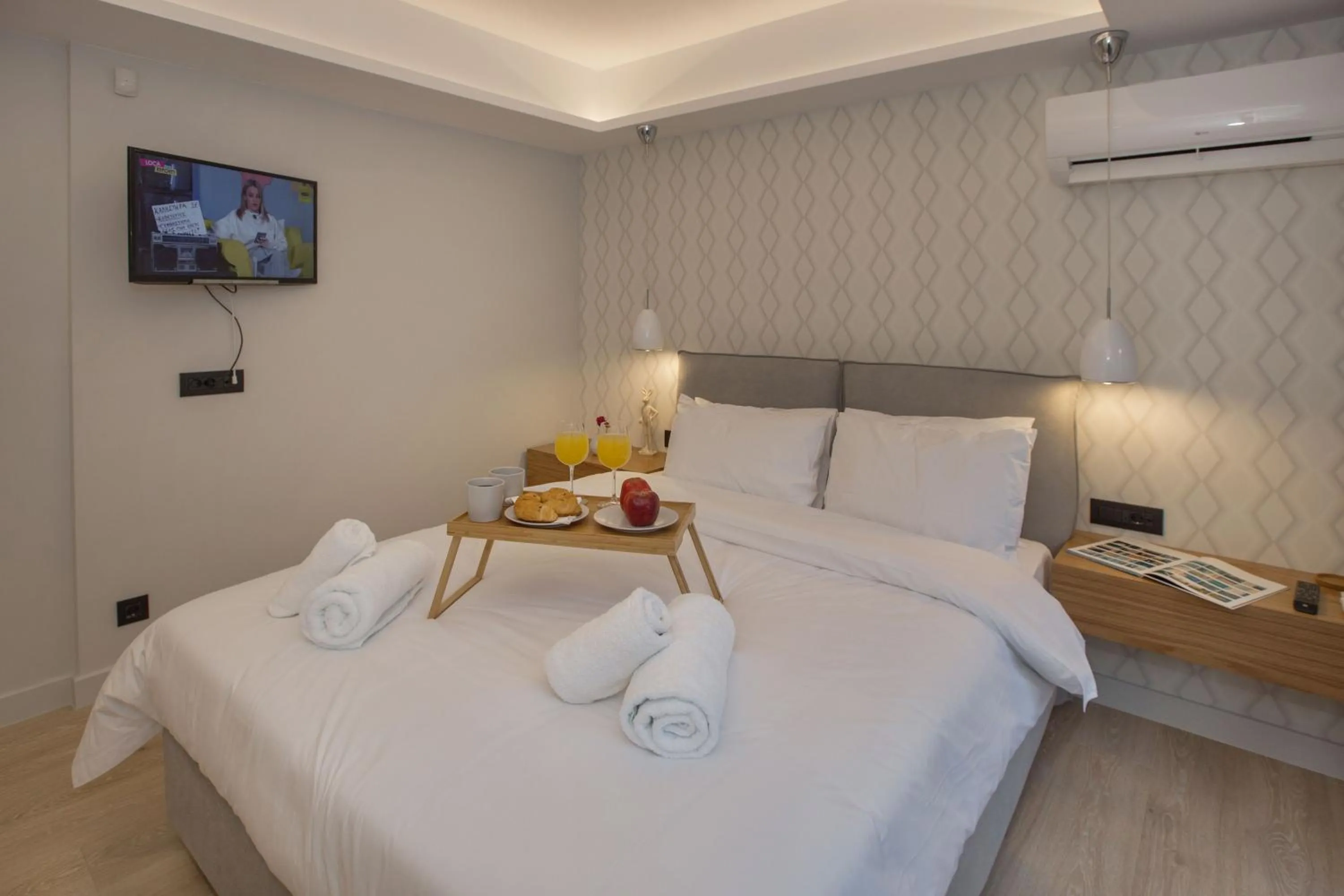 Bed in Acropolis Golden Suites by GHH